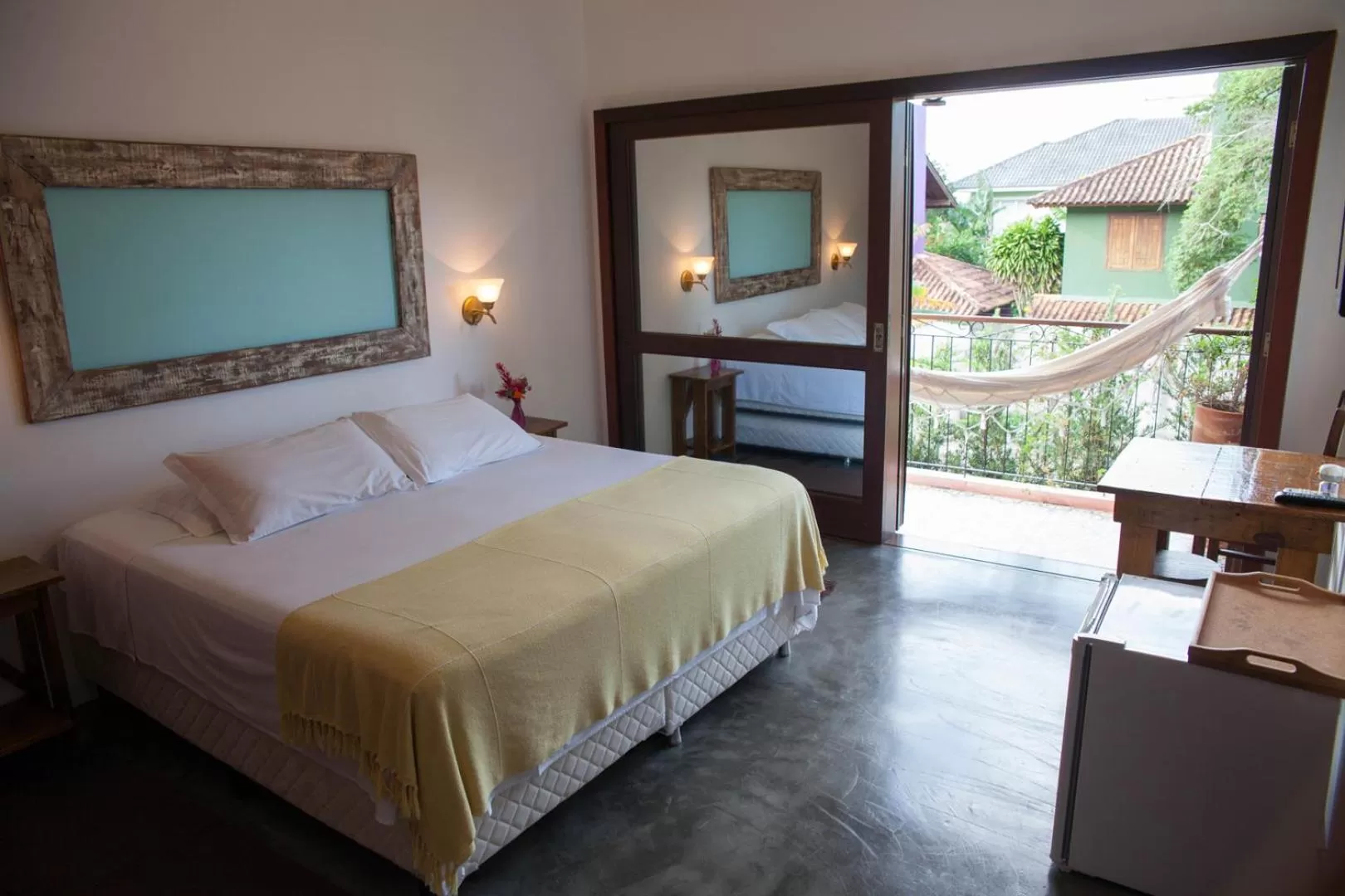 Balcony/Terrace, Bed in Pousada Vila Rosada