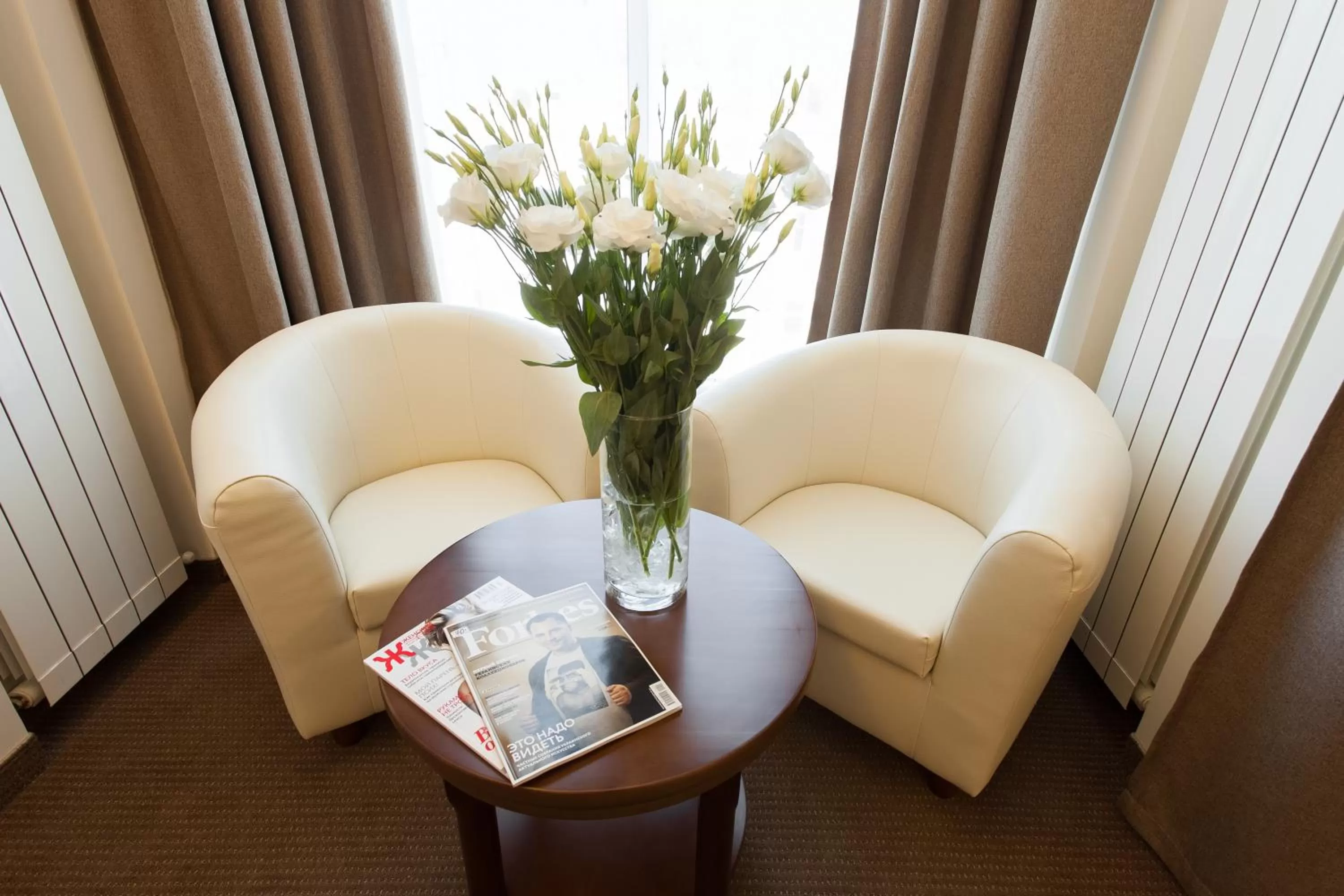 Seating area in Alarus Luxe Hotel