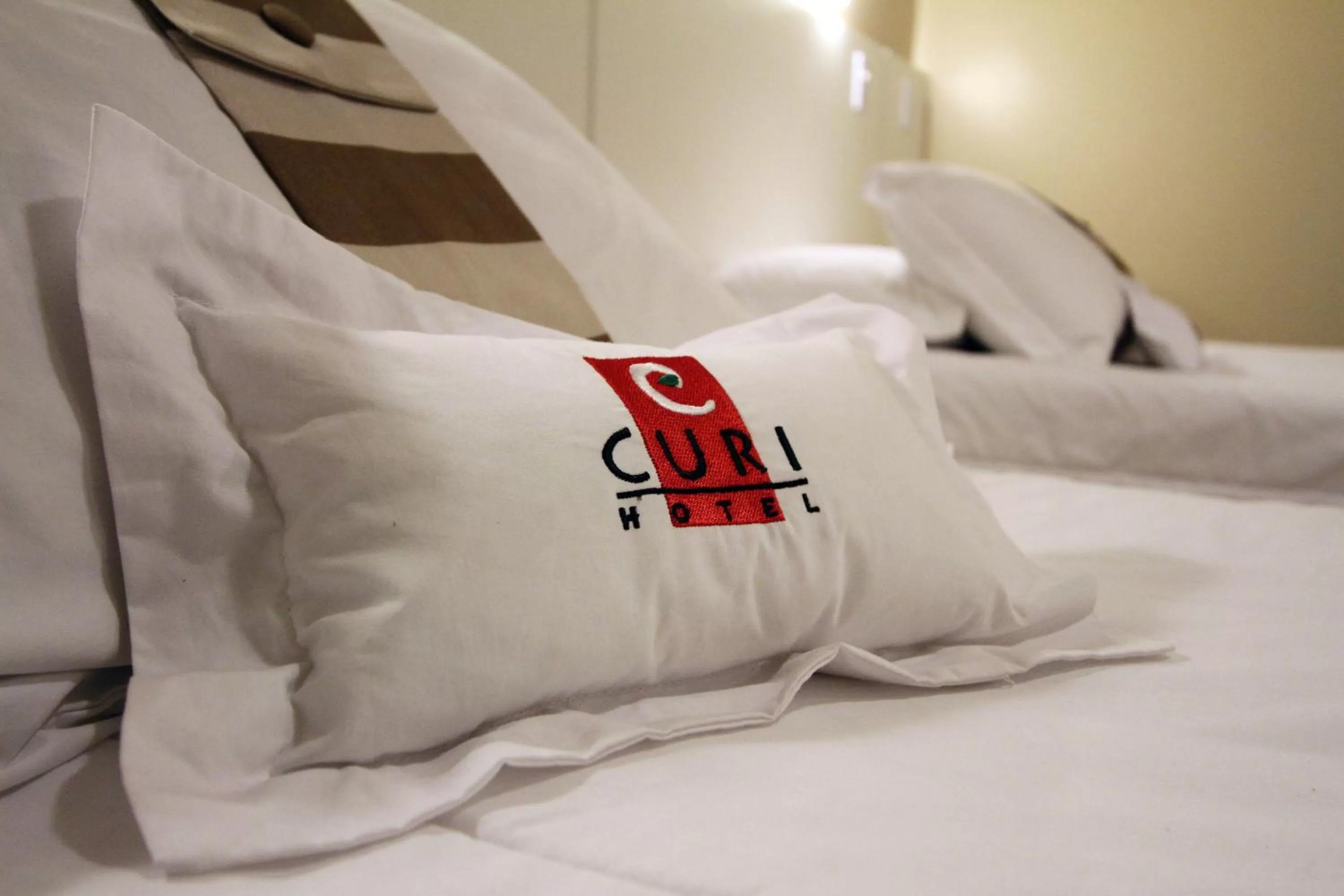 Decorative detail, Bed in Hotel Curi Executive