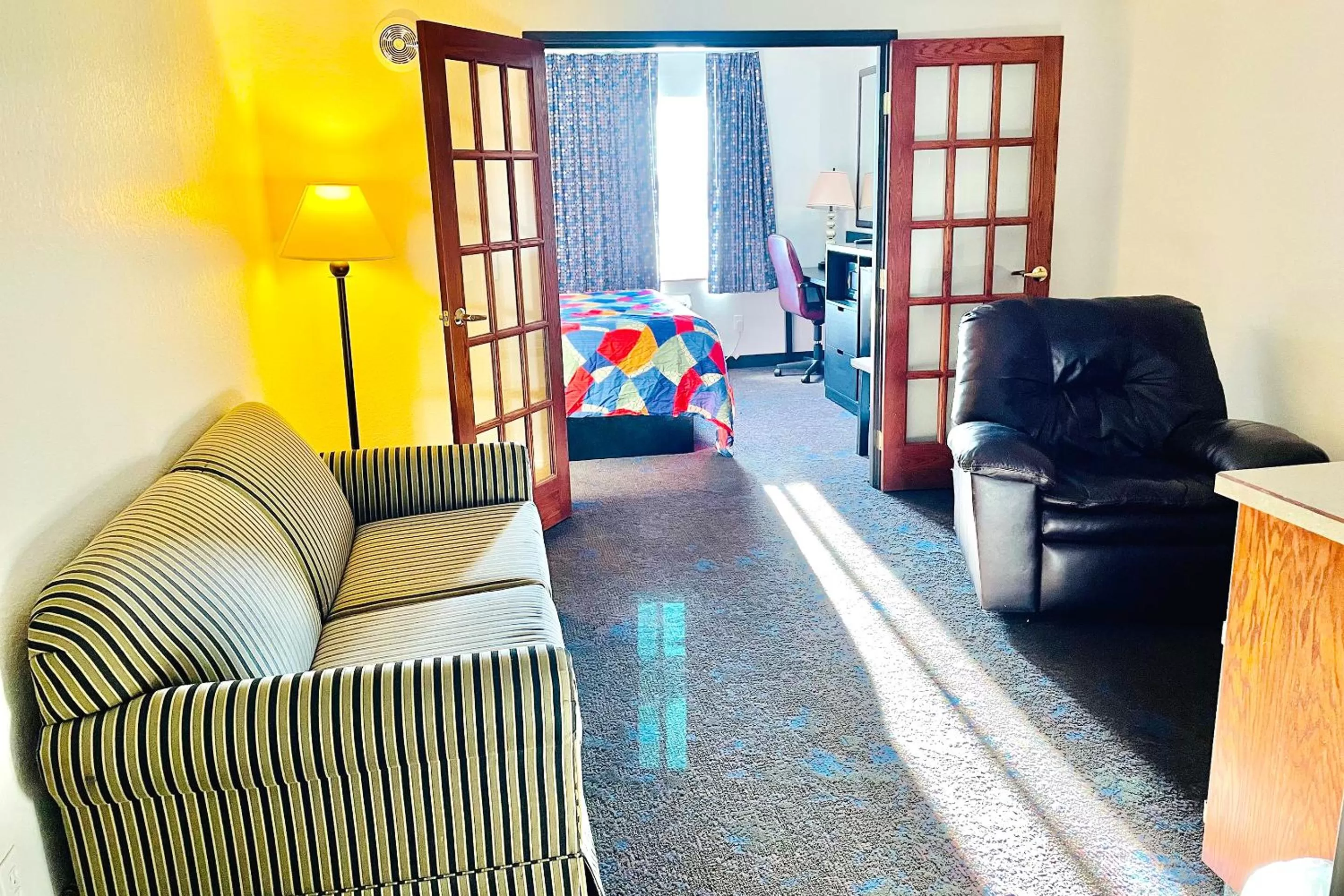 Living room in Coratel Inn & Suites by Jasper Northfield