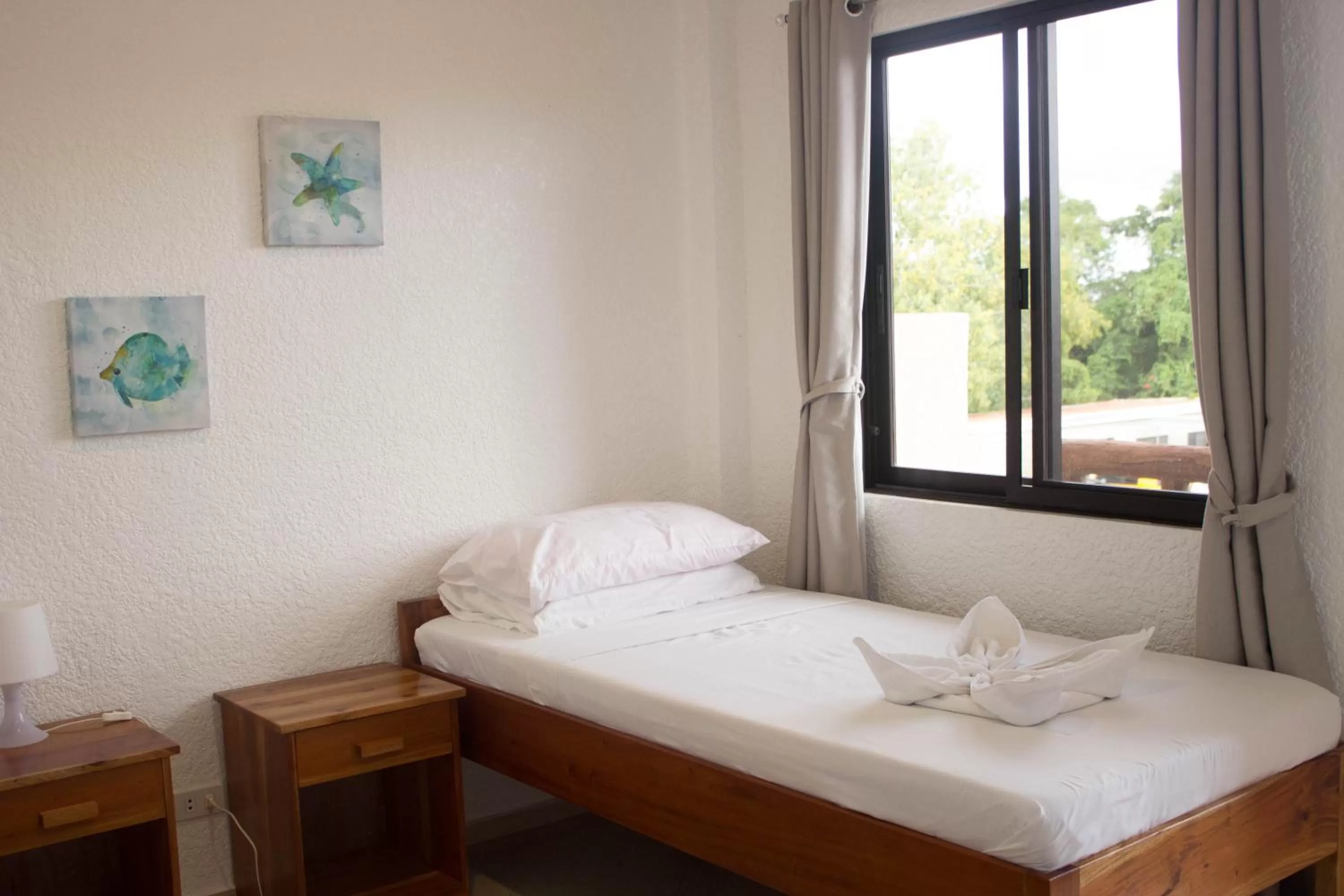 Bed in Jugalis Hotel and Restaurant