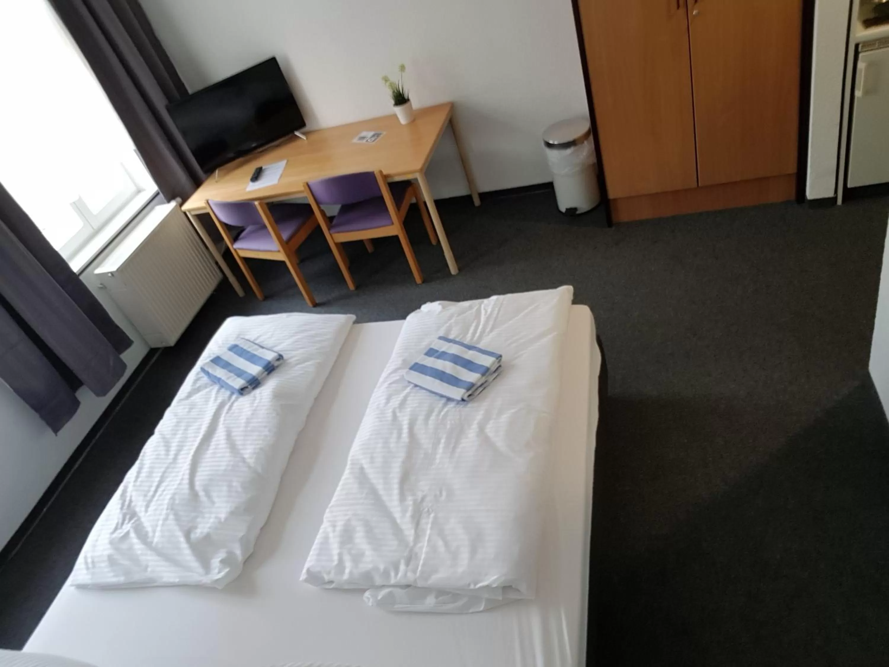 Bed in Appartement-Hotel Rostock