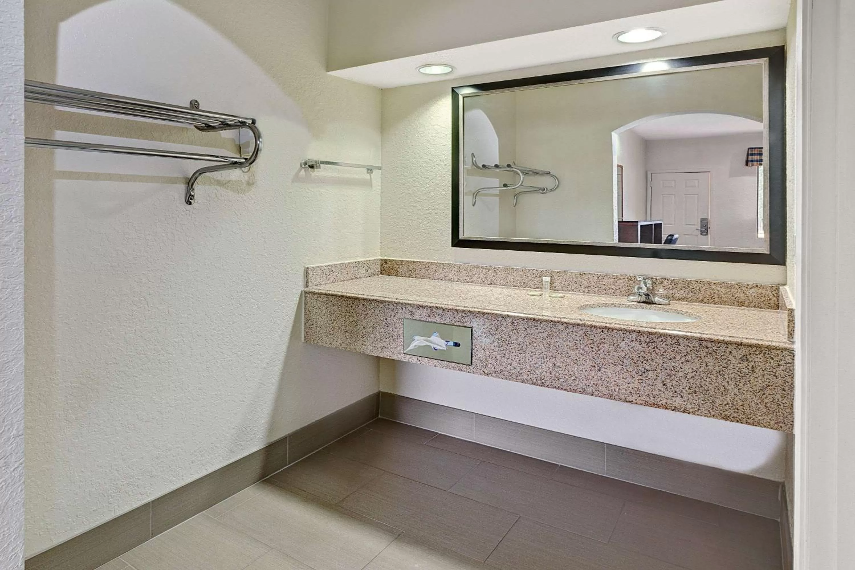 Bathroom in Super 8 by Wyndham Houston Hobby Airport South