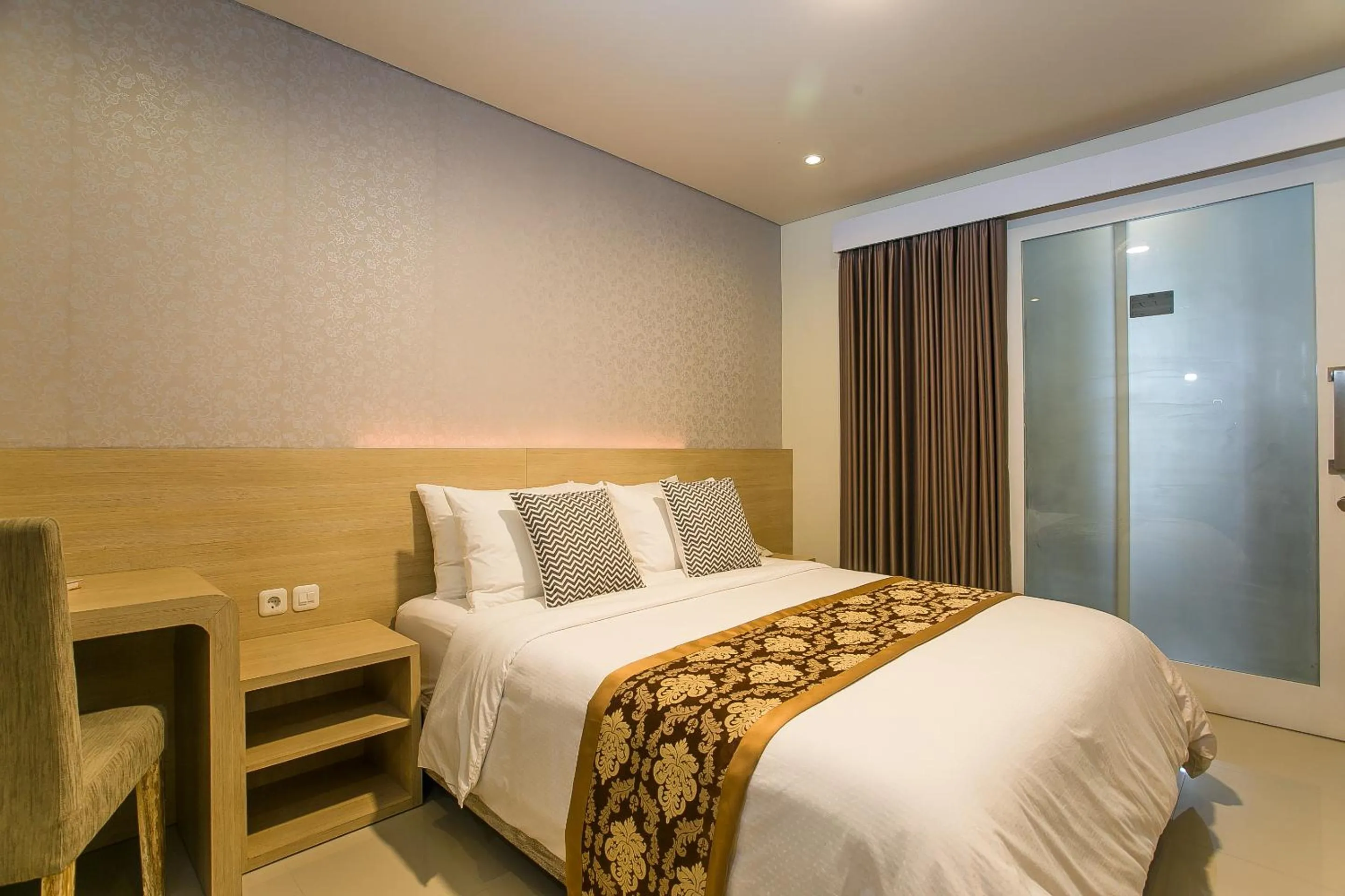 Bed in Mahalaksmi Boutique Hotel