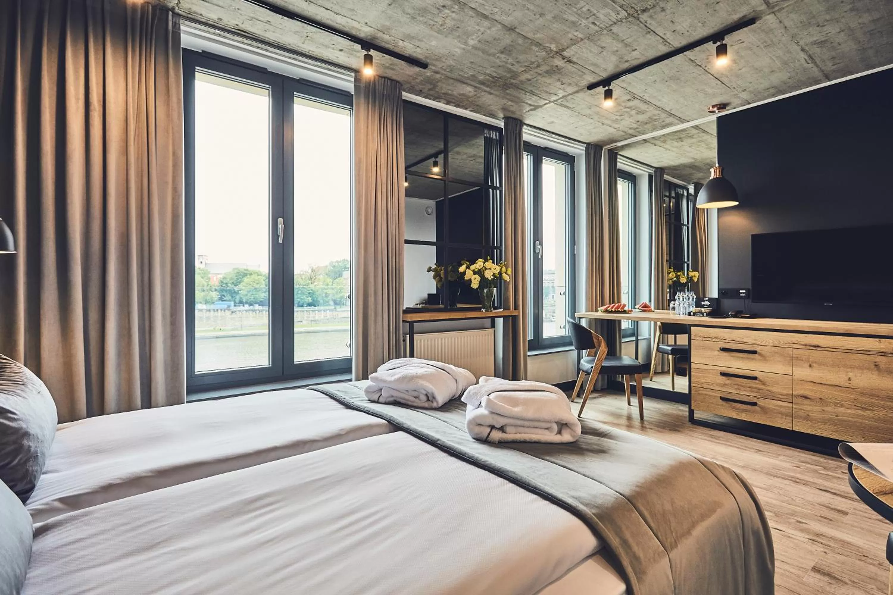 Photo of the whole room, Bed in The Bridge Suites Hotel