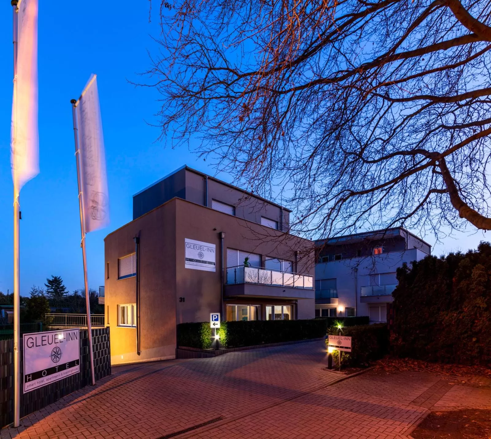 Property Building in GLEUEL INN - digital hotel & serviced apartments & boardinghouse mit voll ausgestatteten Küchen