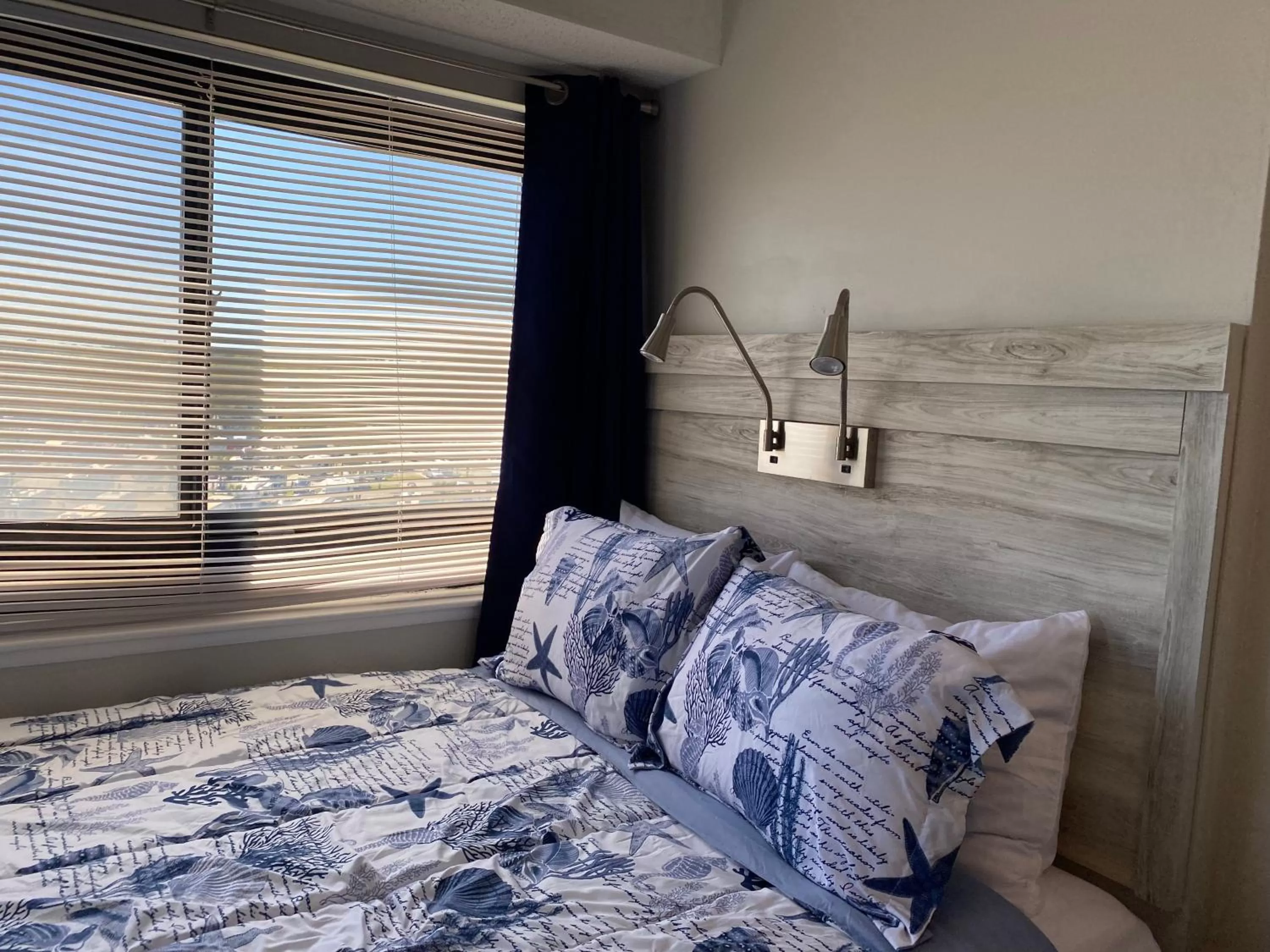 Bed in Escape to Myrtle Beach! Massage-Wine-Photoshoot Packages