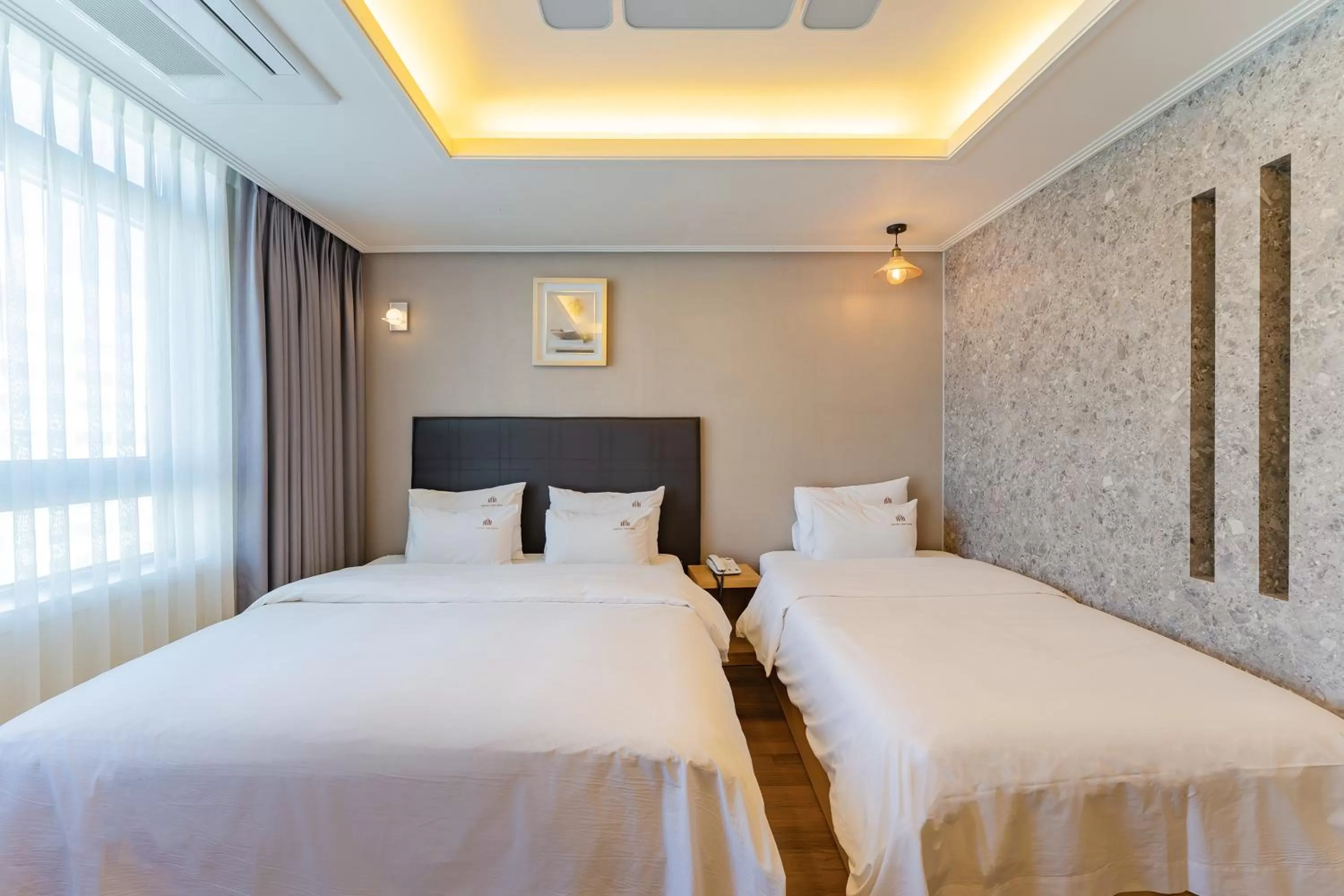 Bed in Central Park Hotel Busan