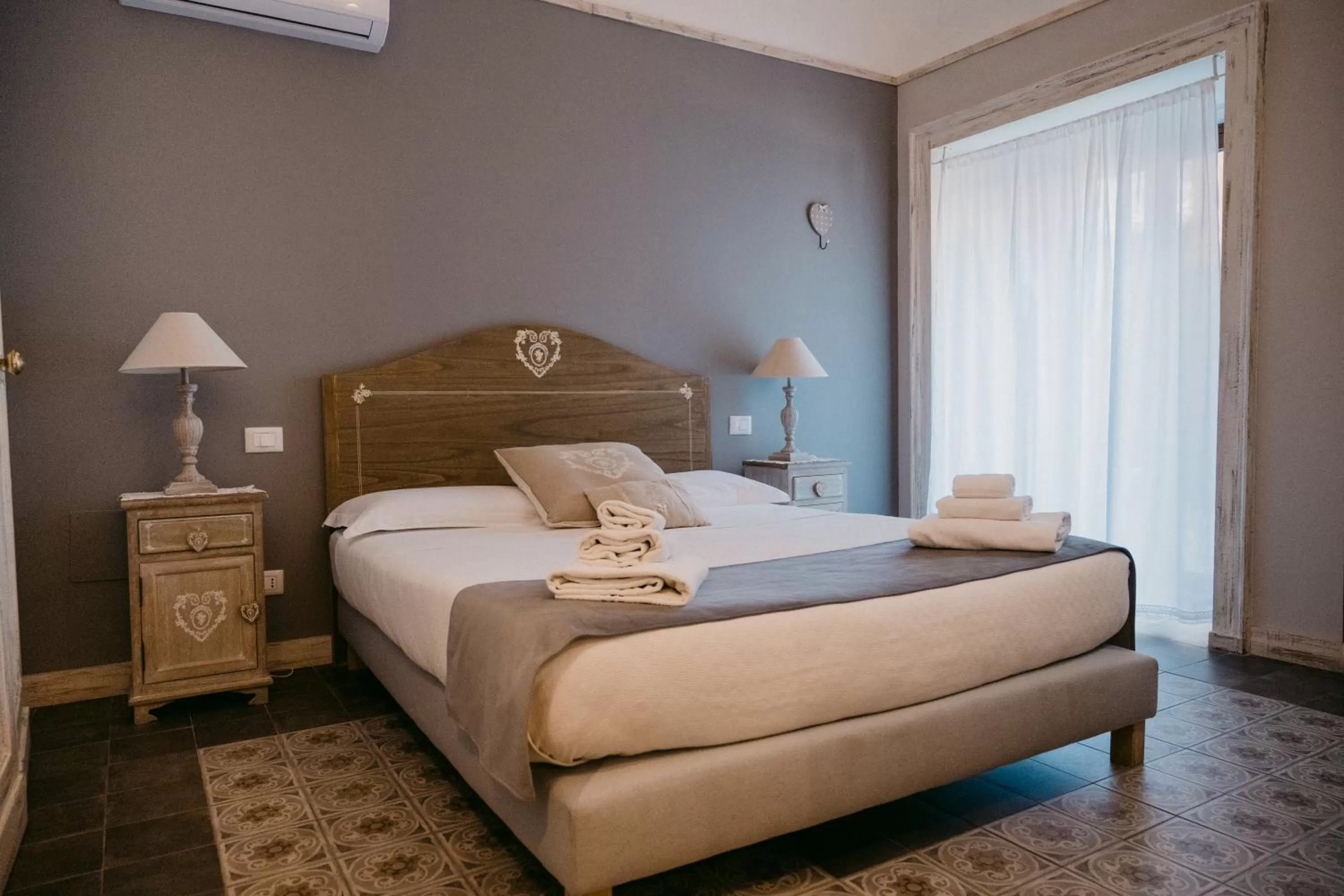 Bed in La Casa di Alma Luxury rooms