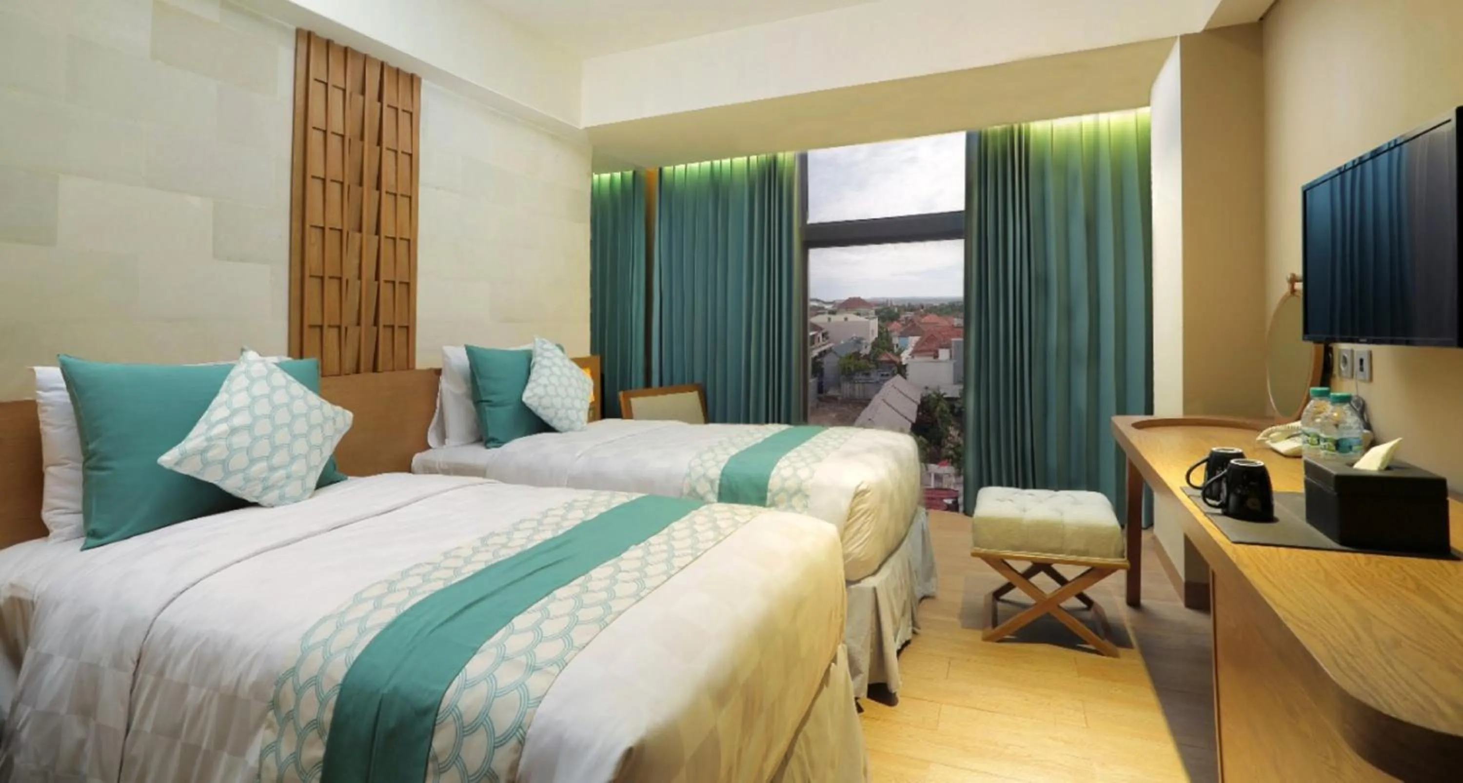 Bed in Bedrock Hotel Kuta