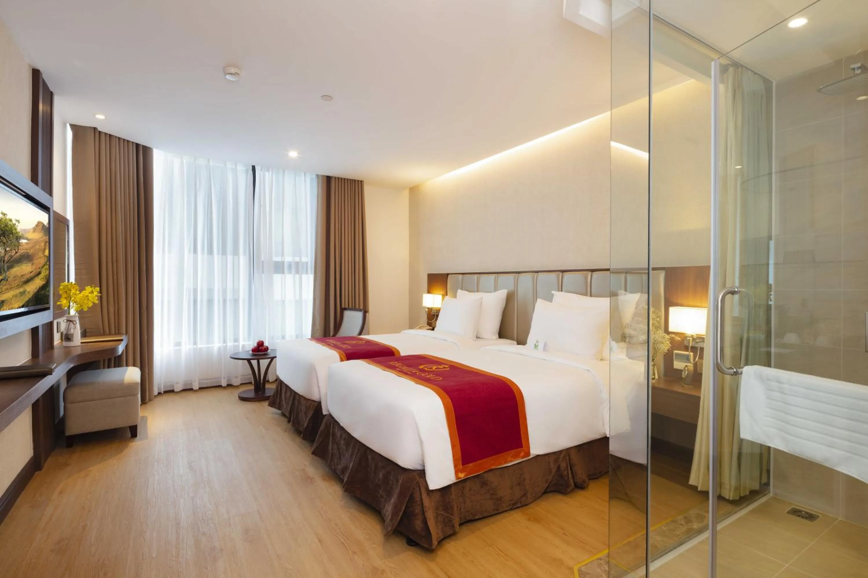 Bed in Regalia Gold Hotel