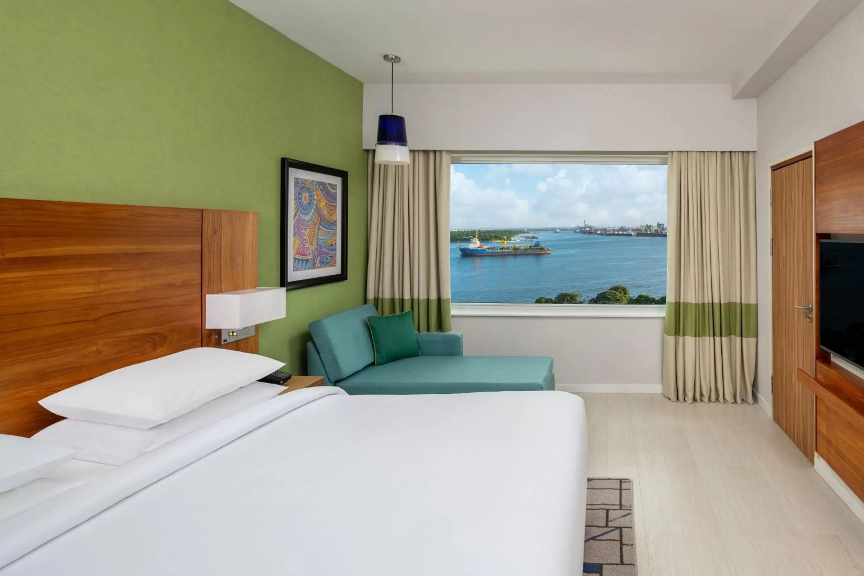 Living room, Bed in Four Points by Sheraton Dar es Salaam New Africa