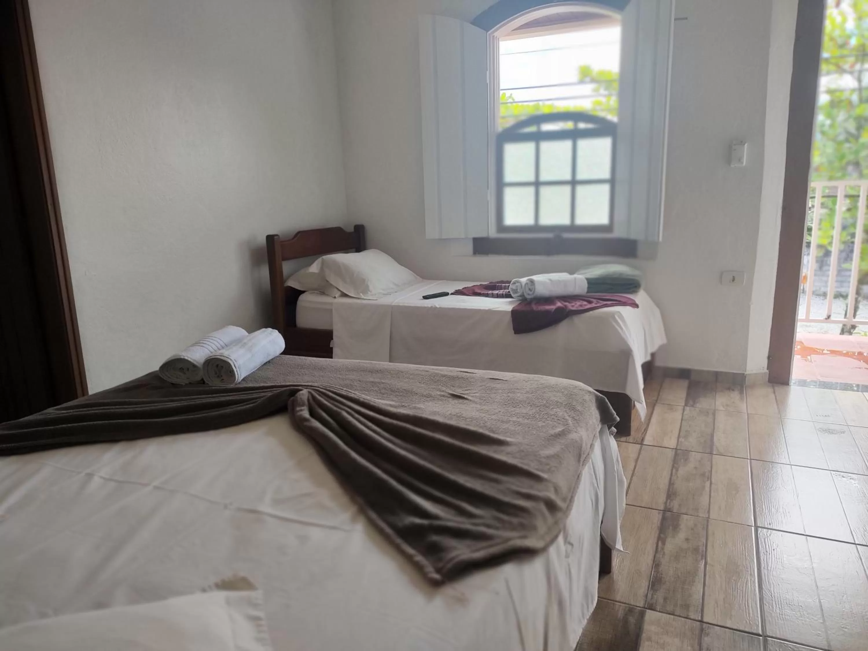 Bedroom, Bed in Hotel Lazaro Ubatuba Ltda