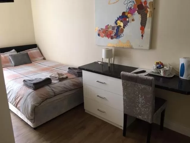 Bed in The Winter Garden Suites