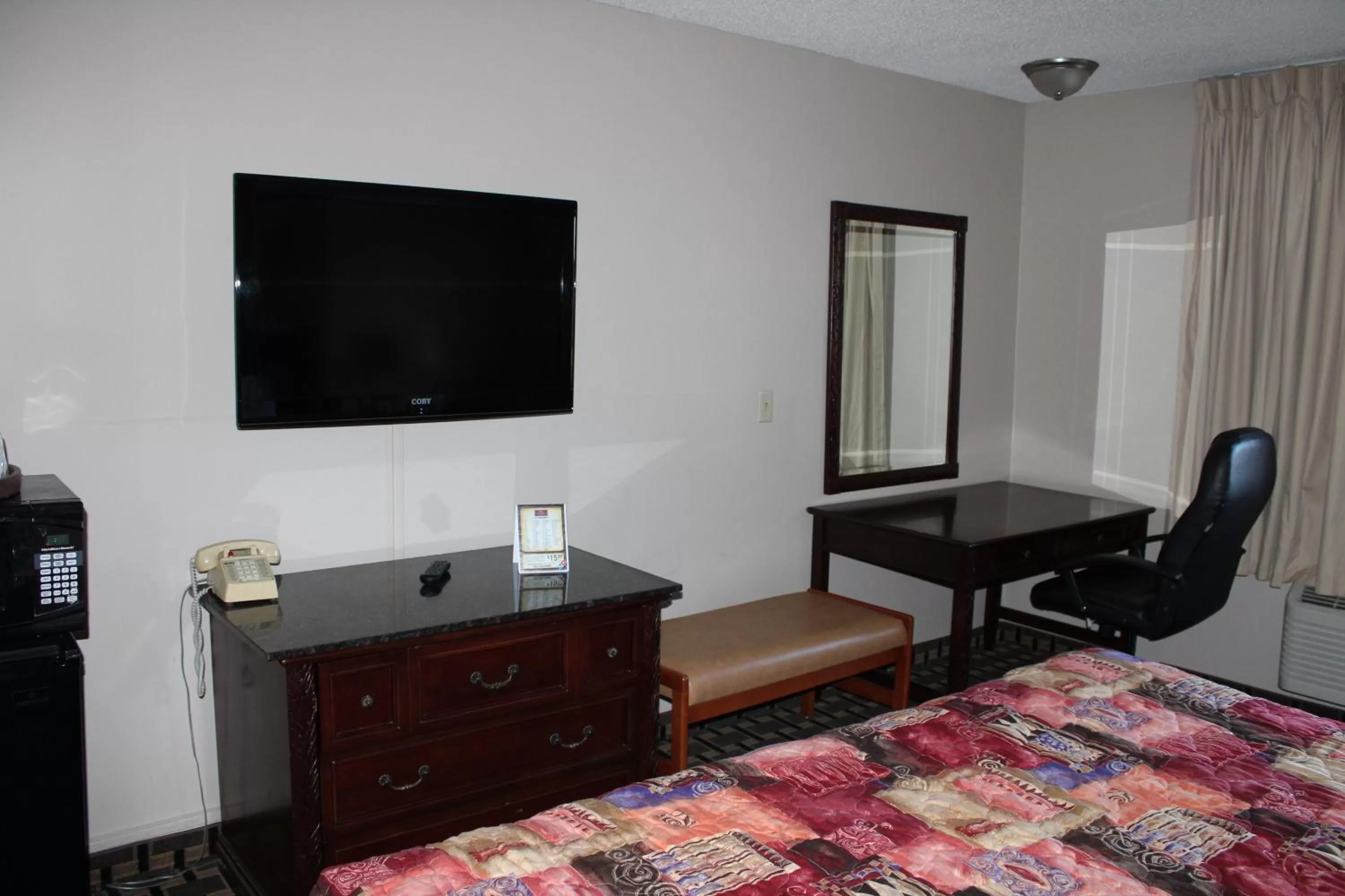 Bedroom, Bed in Coratel Inn and Suites Maple Grove