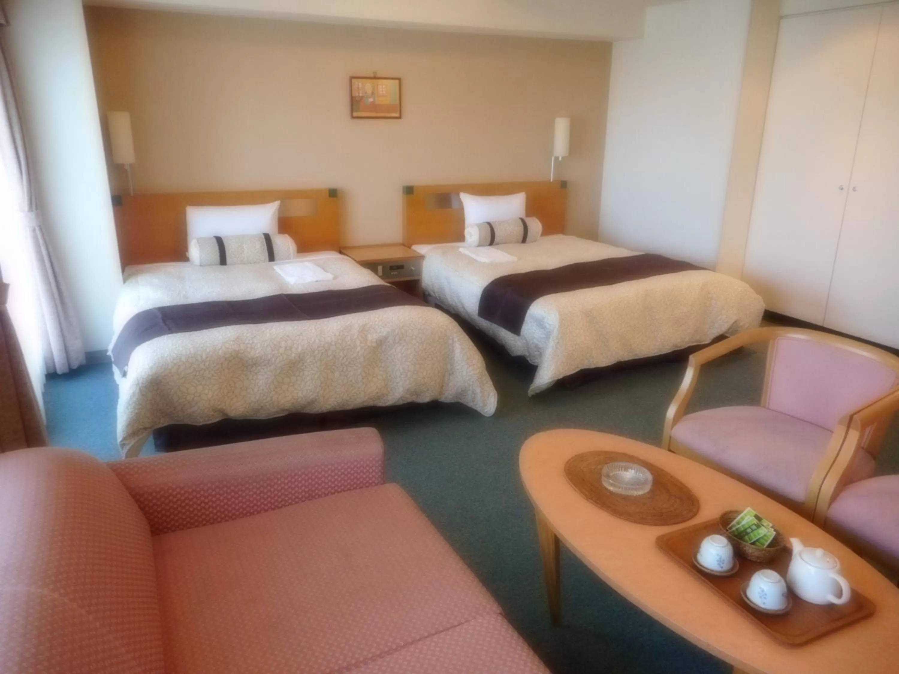 Living room, Bed in Kuretake Inn Asahikawa
