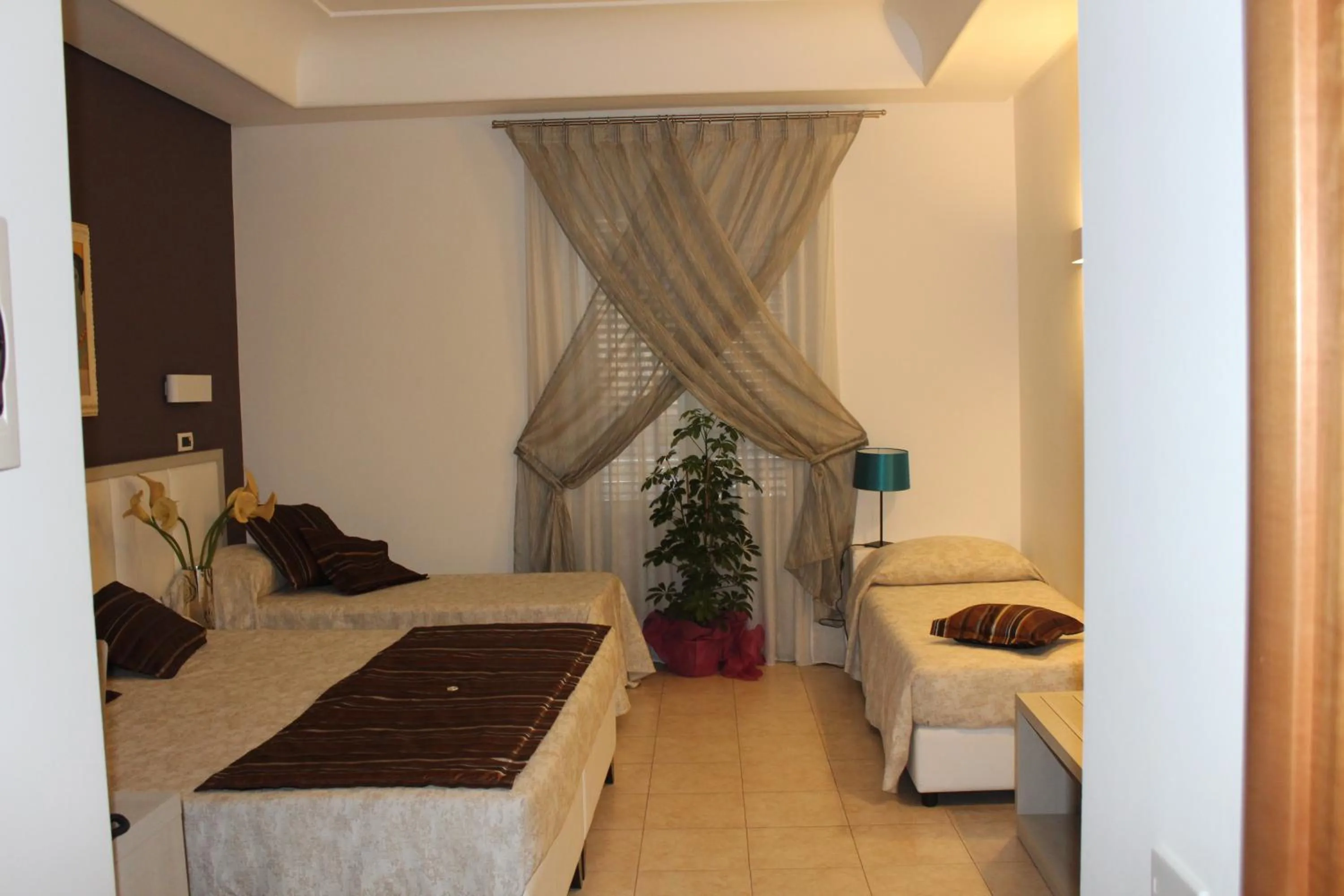 Bed in Artemisia Palace Hotel