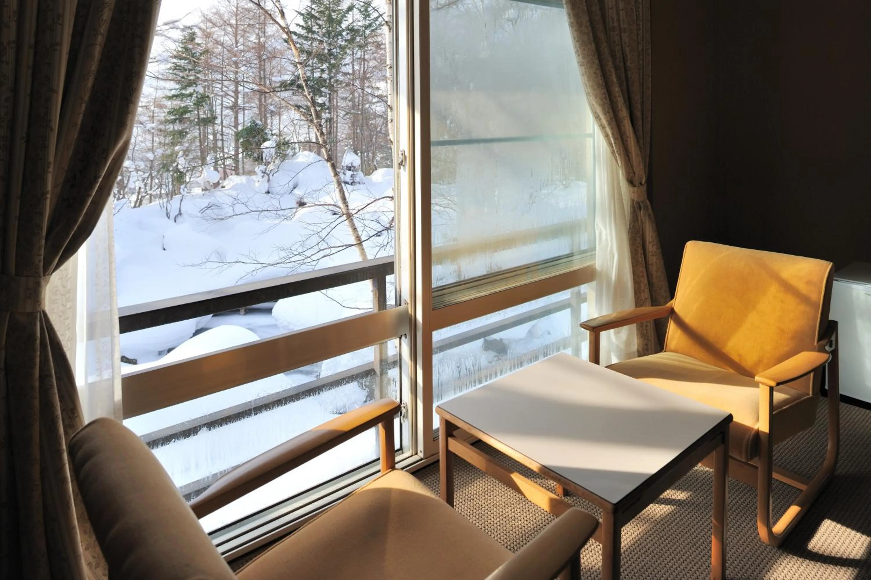 Seating area in Mogamitakayu Zenshichinoyu Ohira