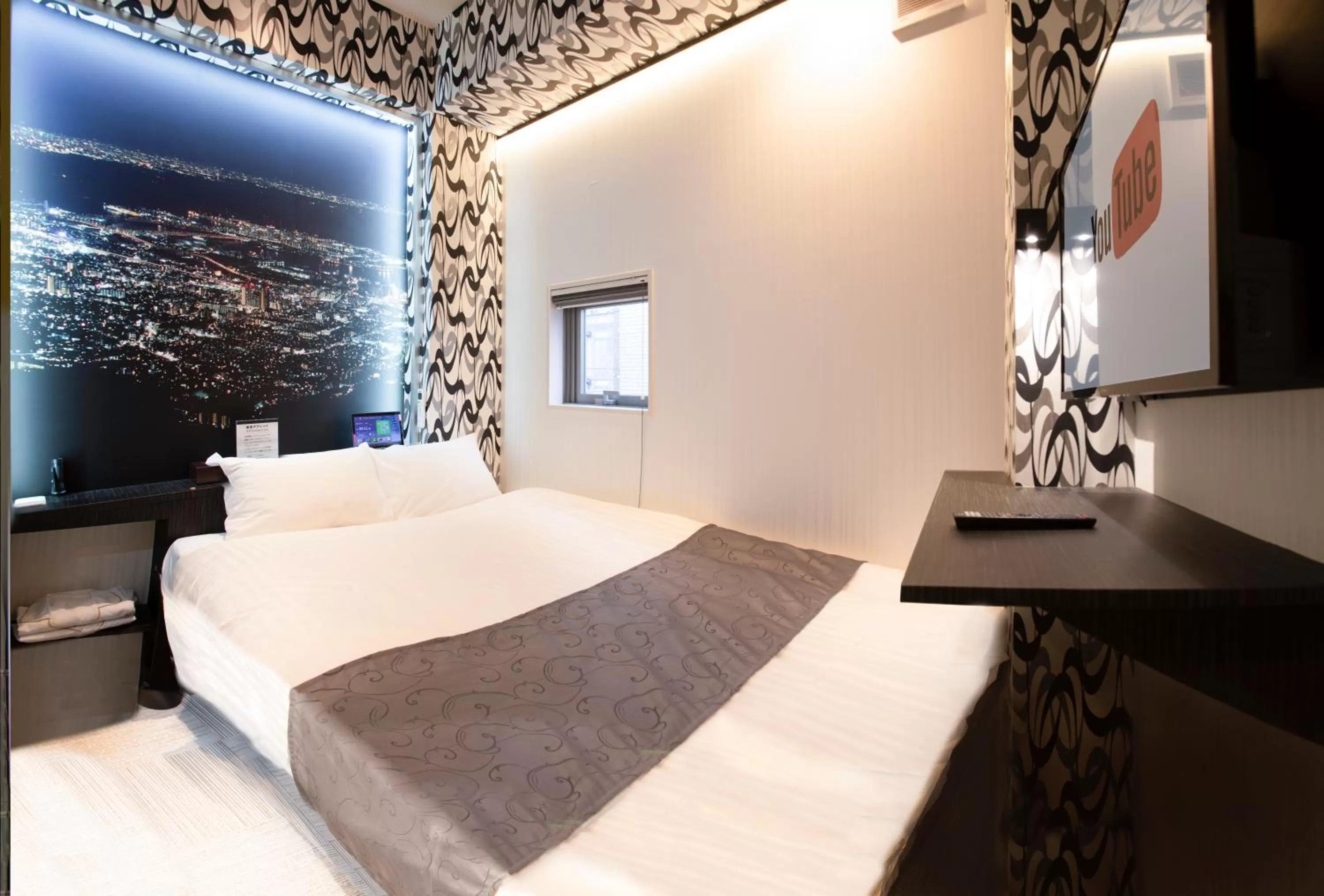 Photo of the whole room, Bed in Pinpon Hotel Hiroshima