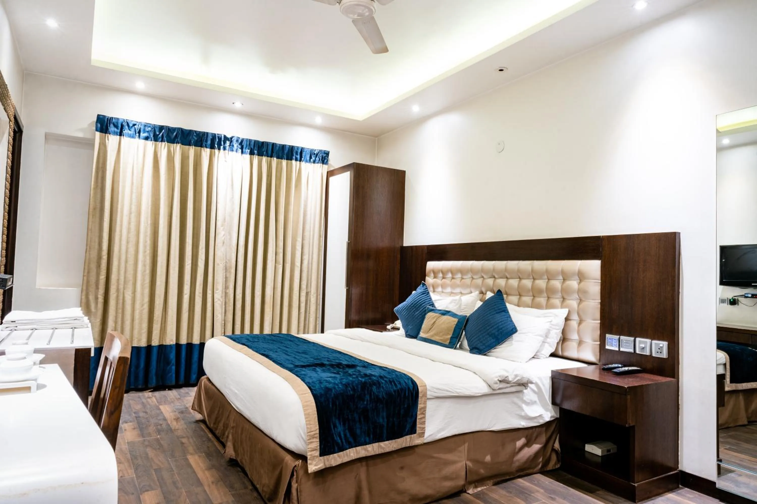 Photo of the whole room, Bed in Hotel Grand Godwin - Near New Delhi Railway Station - Paharganj