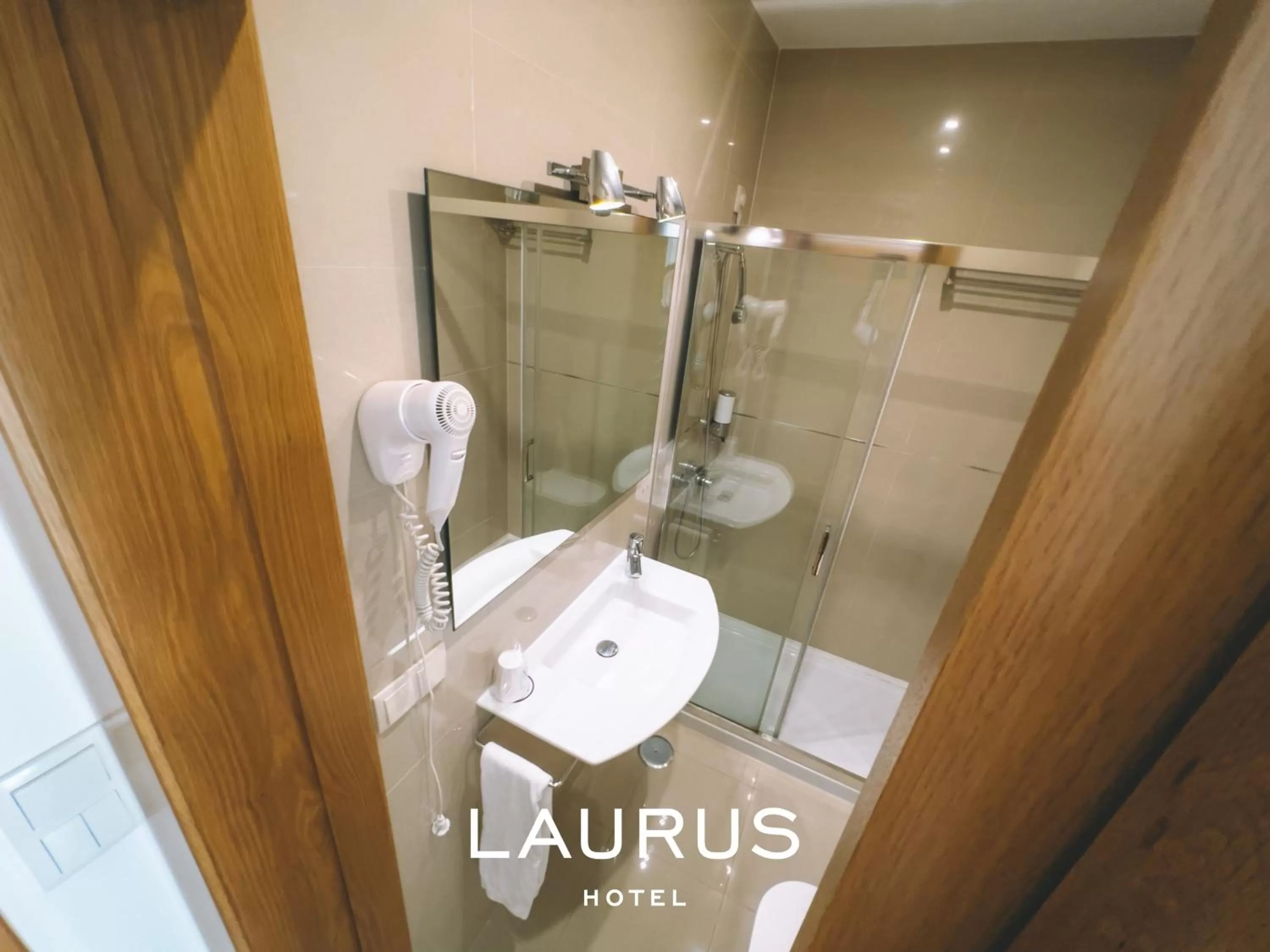 Toilet in Laurus Hotel