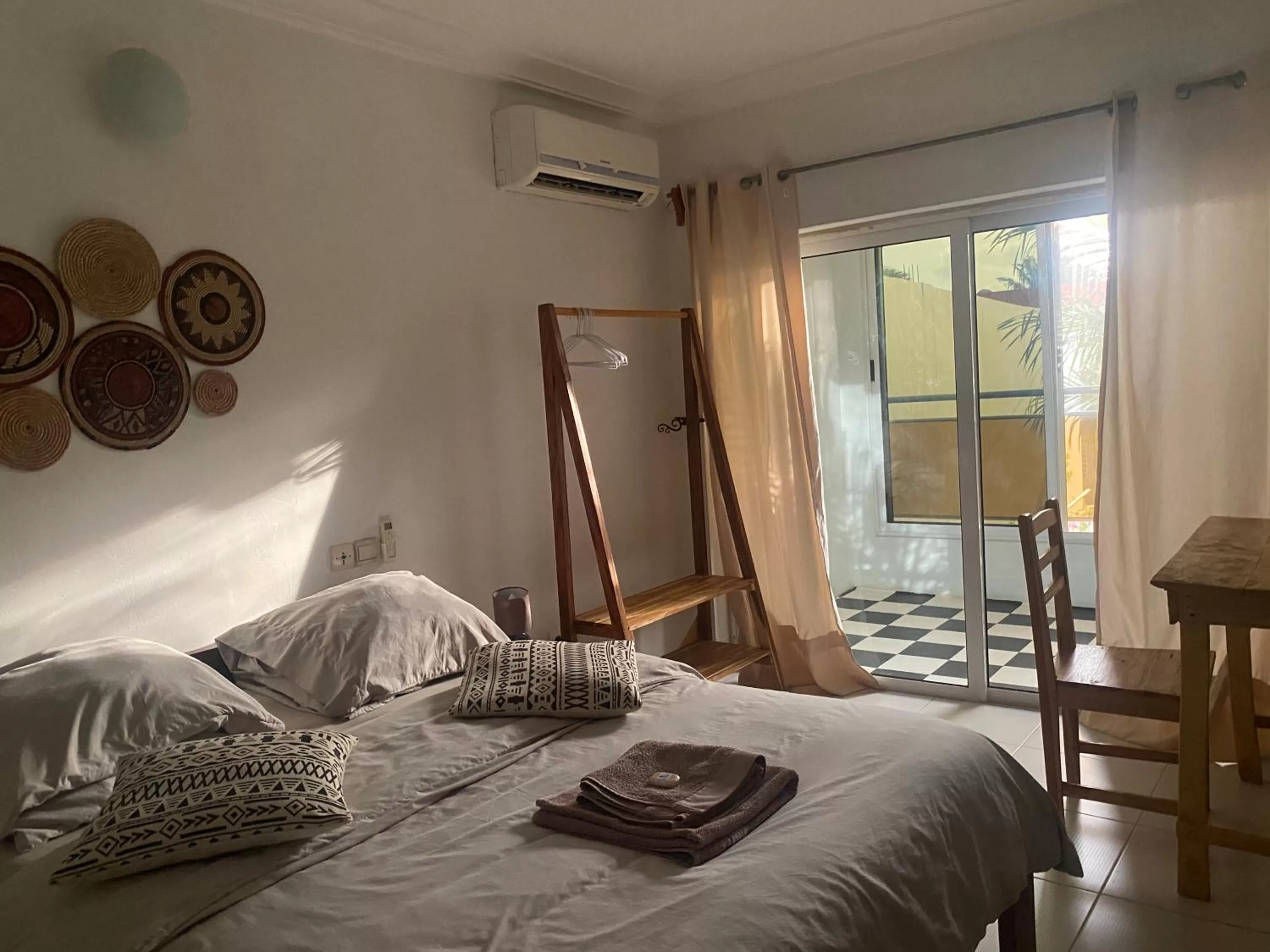 Bed in L'Oasis Guesthouse