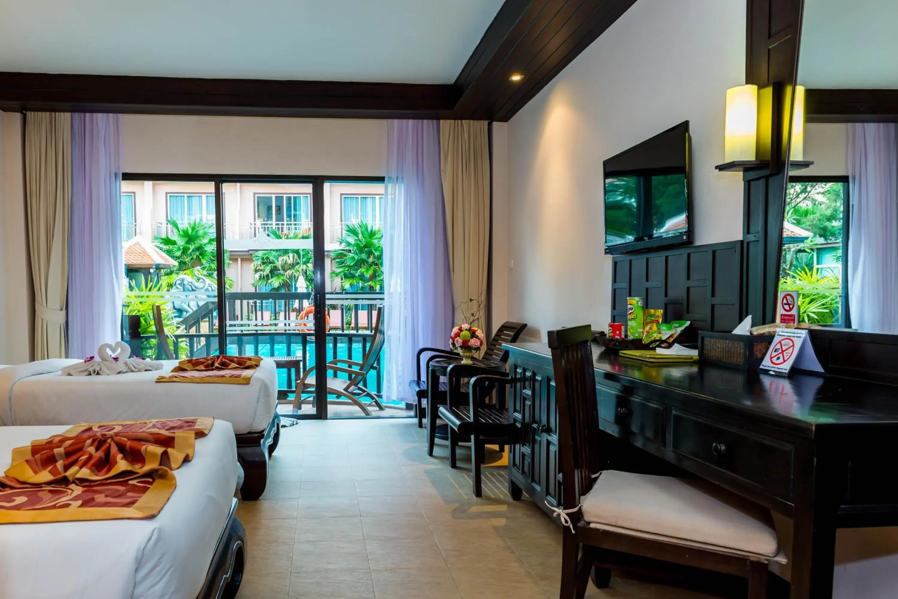 Grand Deluxe Double or Twin Room with Pool Access in Nipa Resort, Patong Beach Grand Deluxe Double or Twin Room with Pool Access in Nipa Resort, Patong Beach