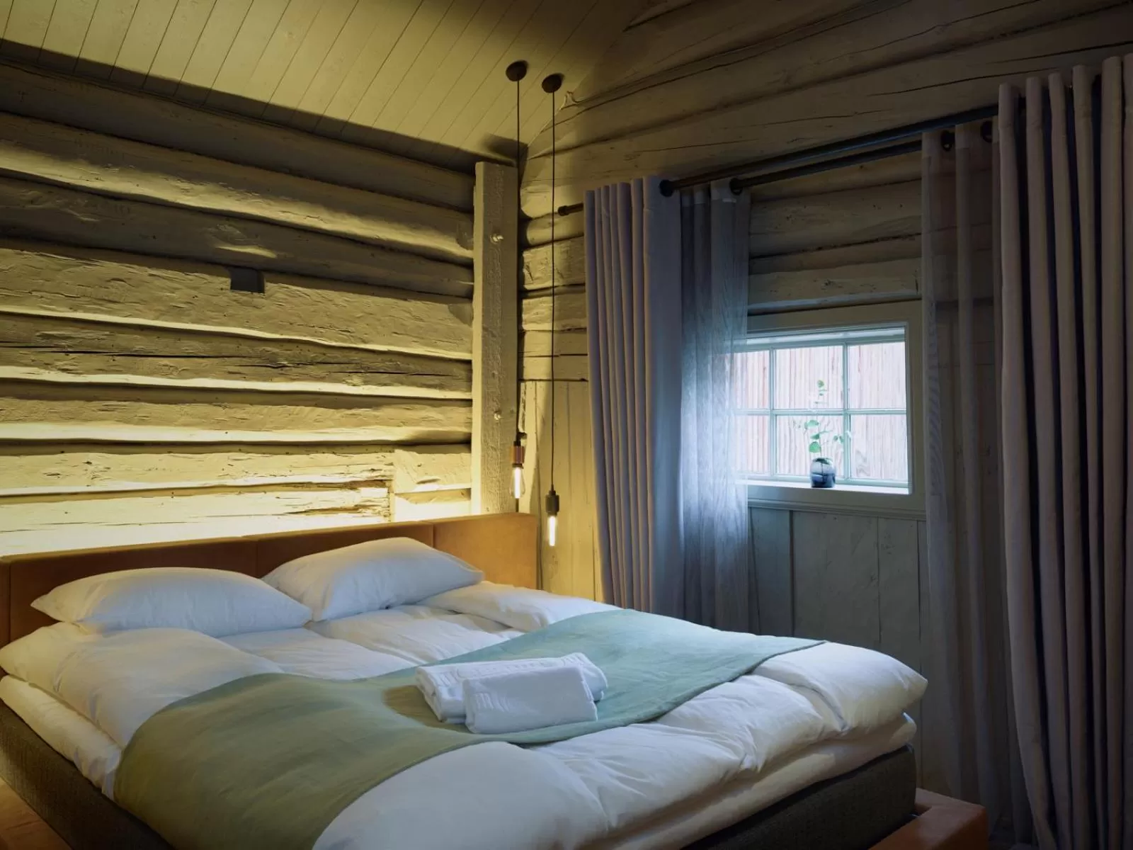 Bedroom in Tollboden Hotell - Unike Hoteller