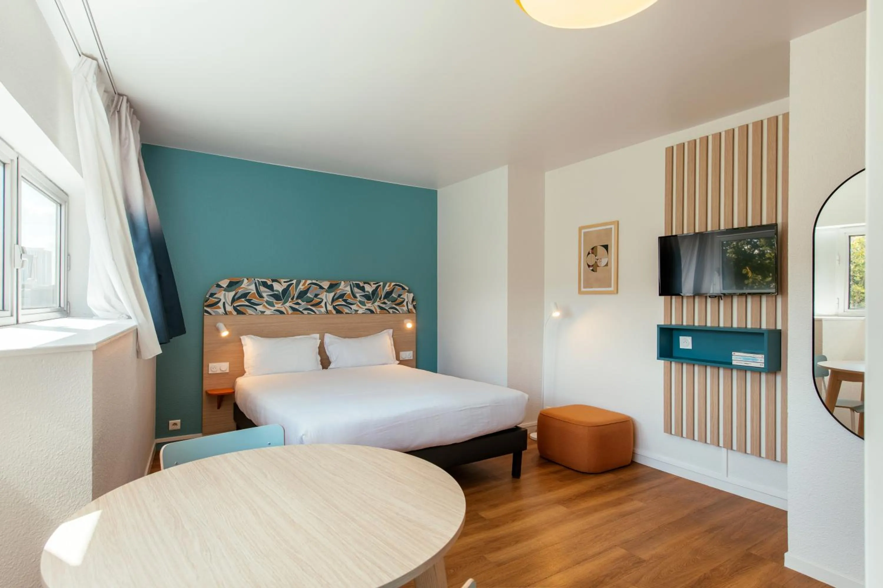 Photo of the whole room, Bed in Aparthotel Adagio Access Paris La Villette