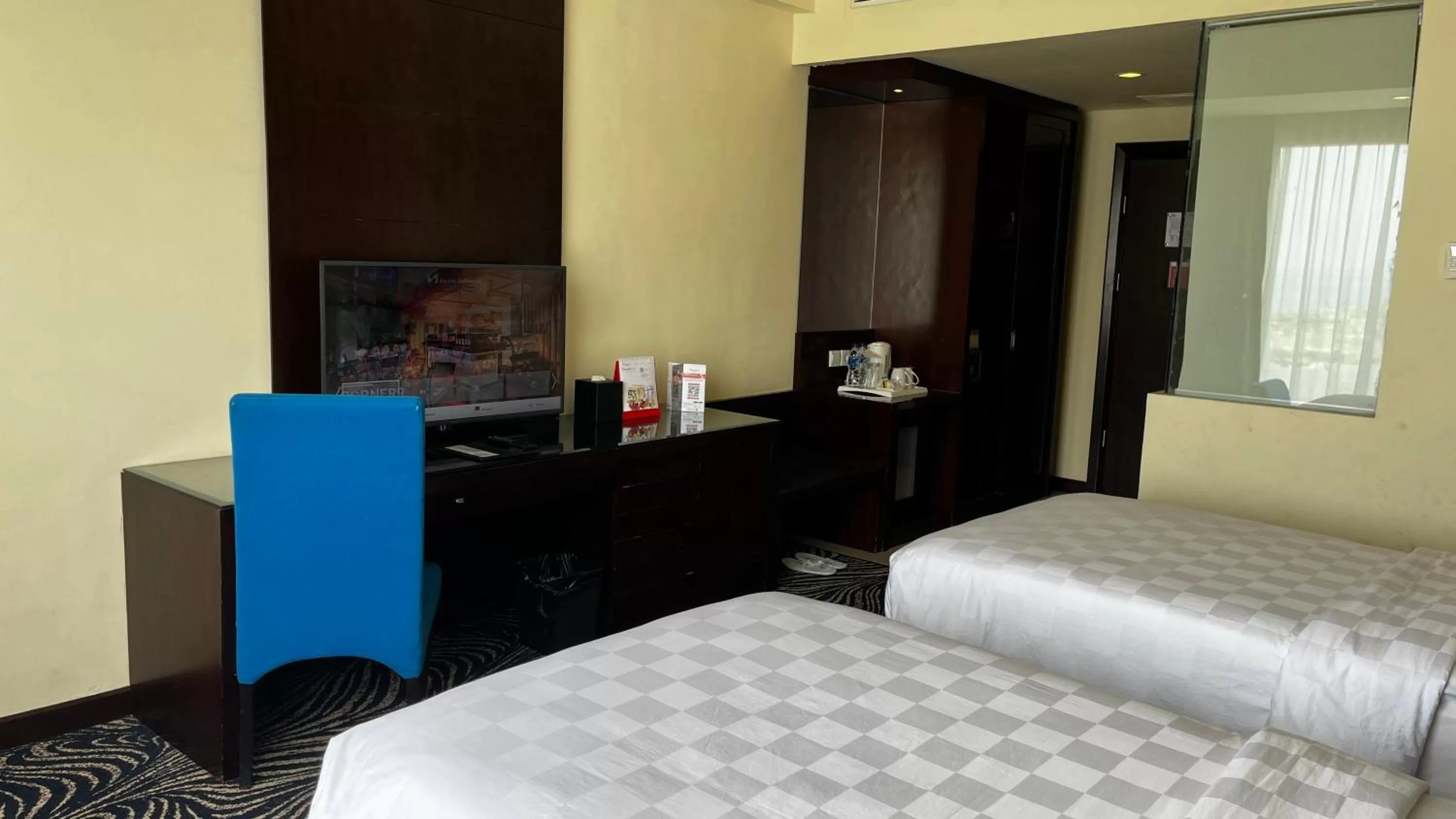 TV and multimedia, Bed in Swiss-Belhotel Silae Palu