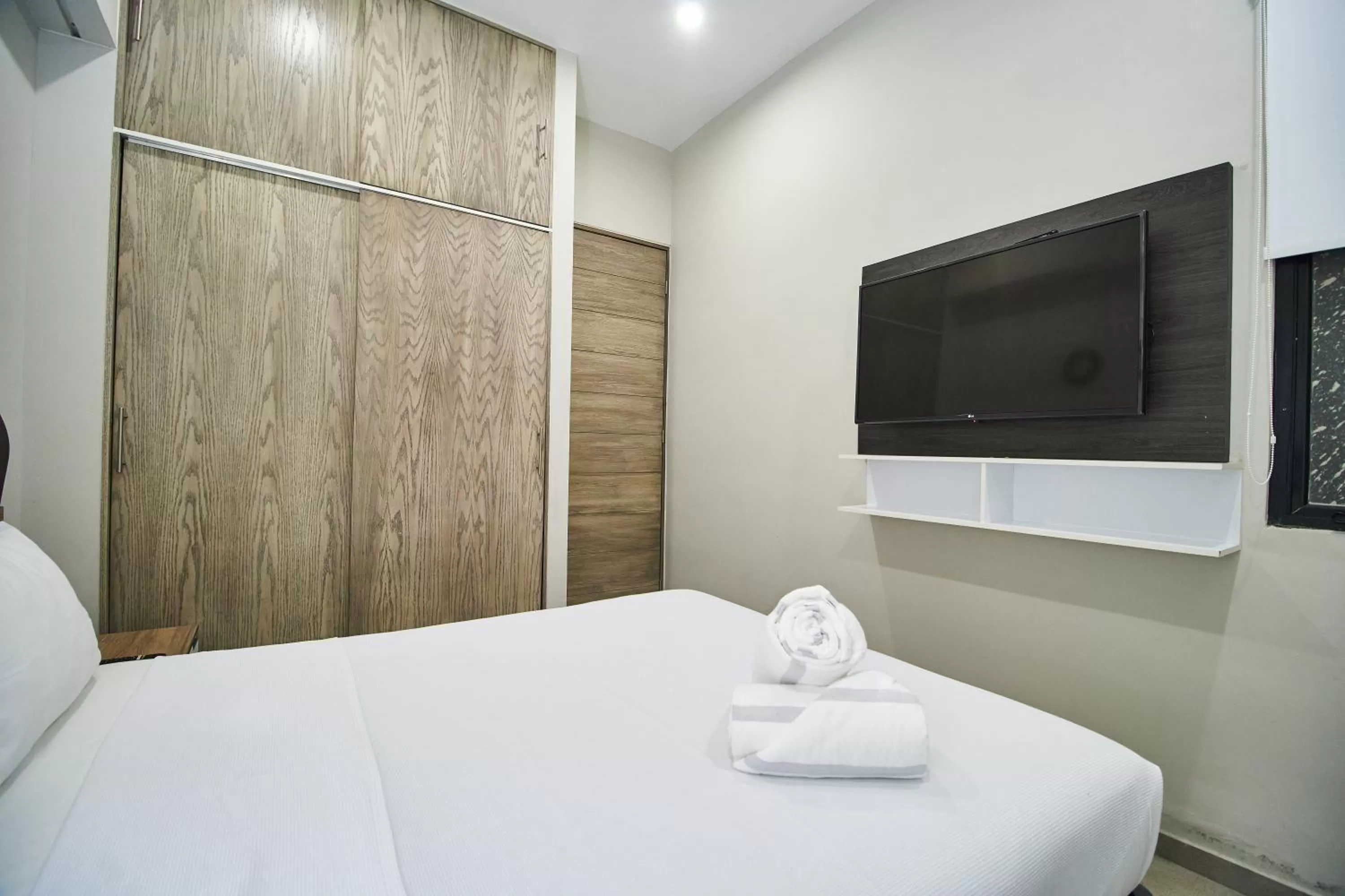 Bed in Torre 42 Playa del Carmen by Lockey