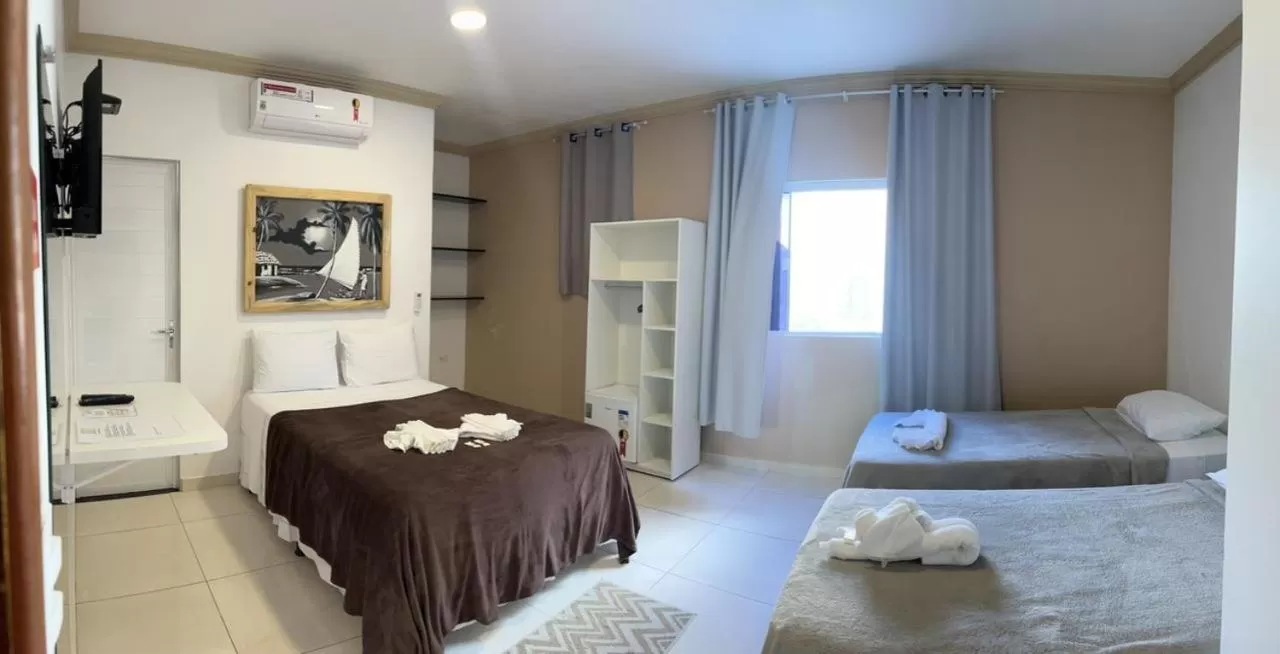 Bed in Pousada La Belle