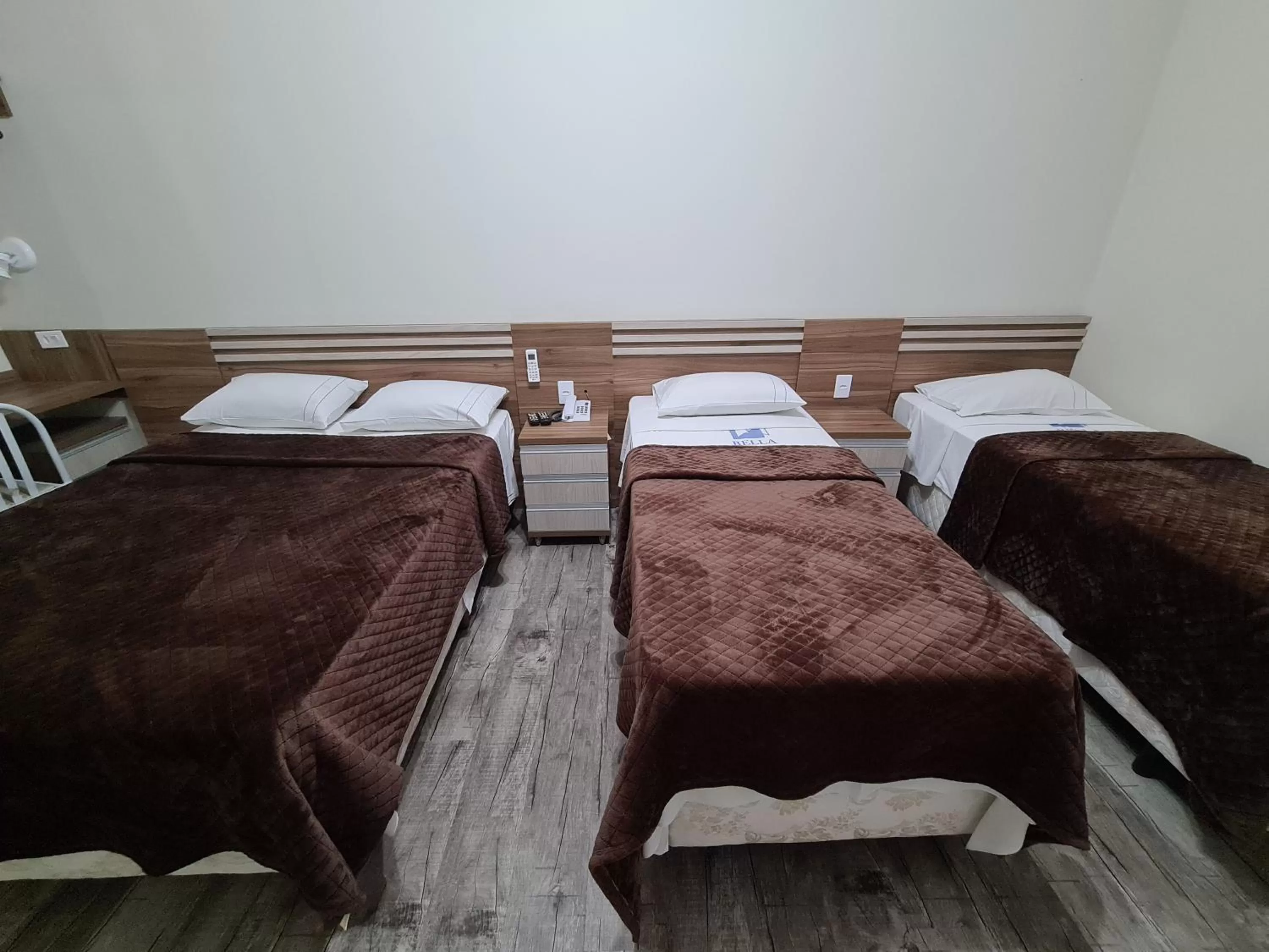 Bed in Bella Augusta Hotel