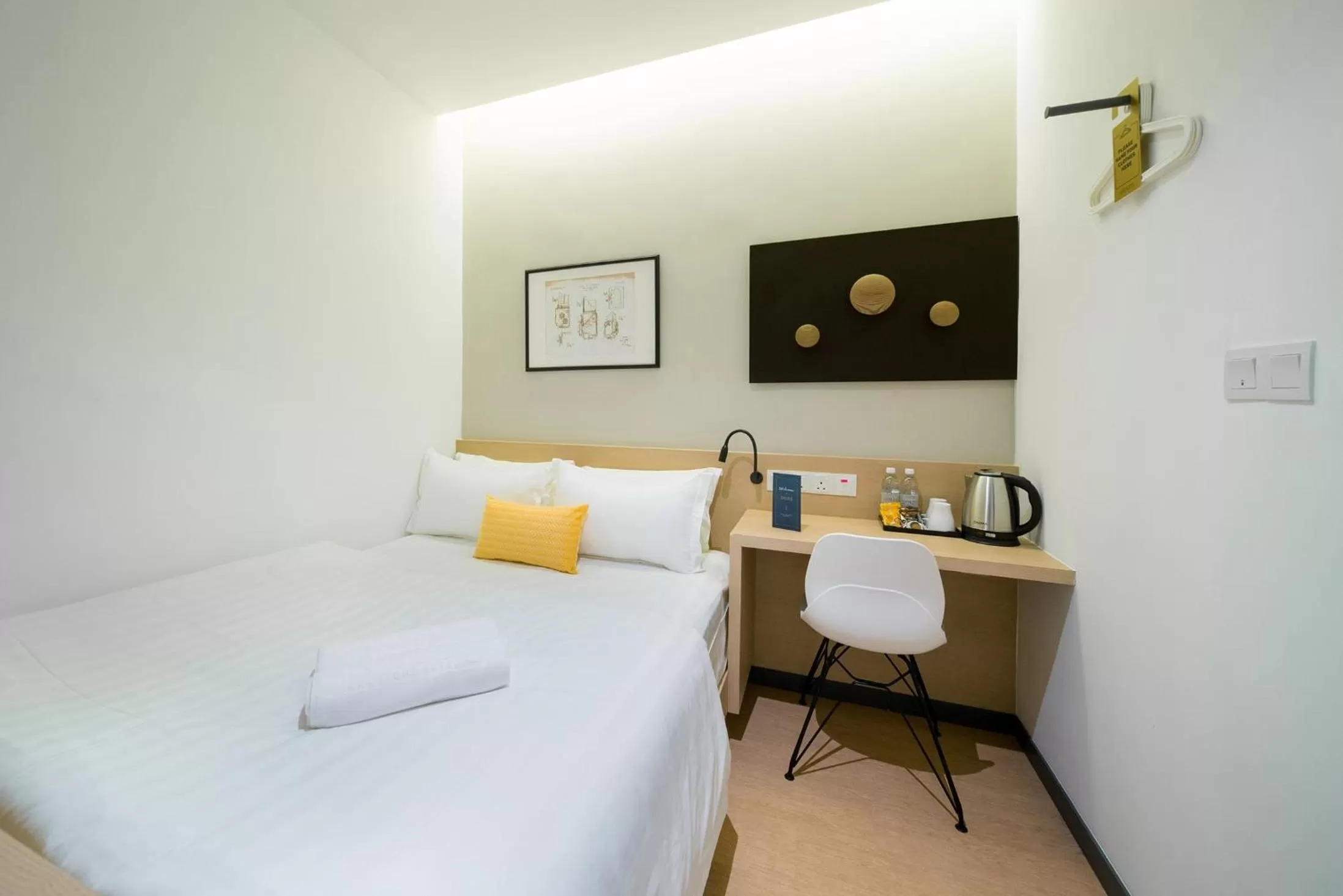 Bed in Riverfront Boutique Hotel