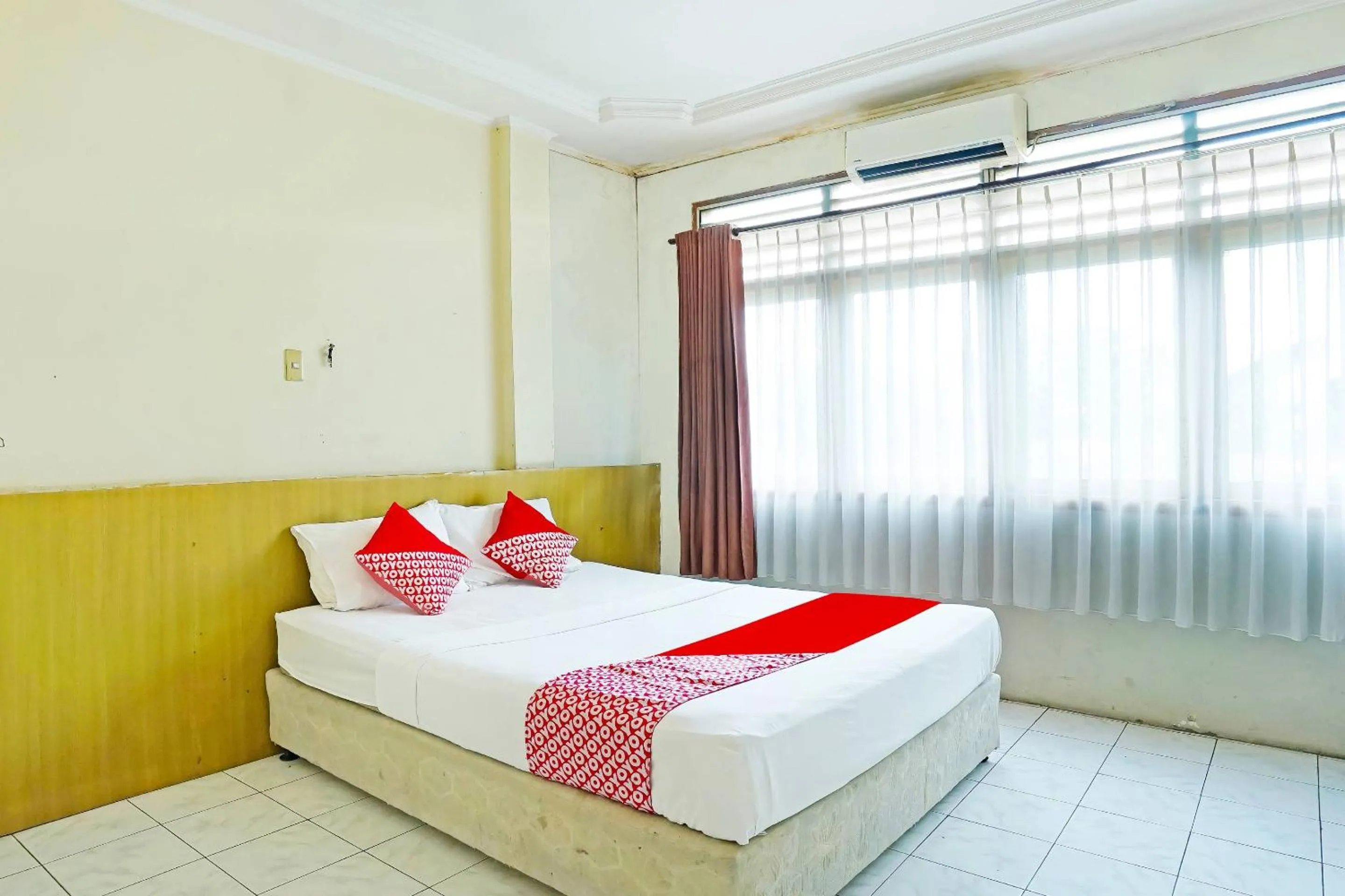Bedroom, Bed in OYO 90390 Hotel Rd Premium