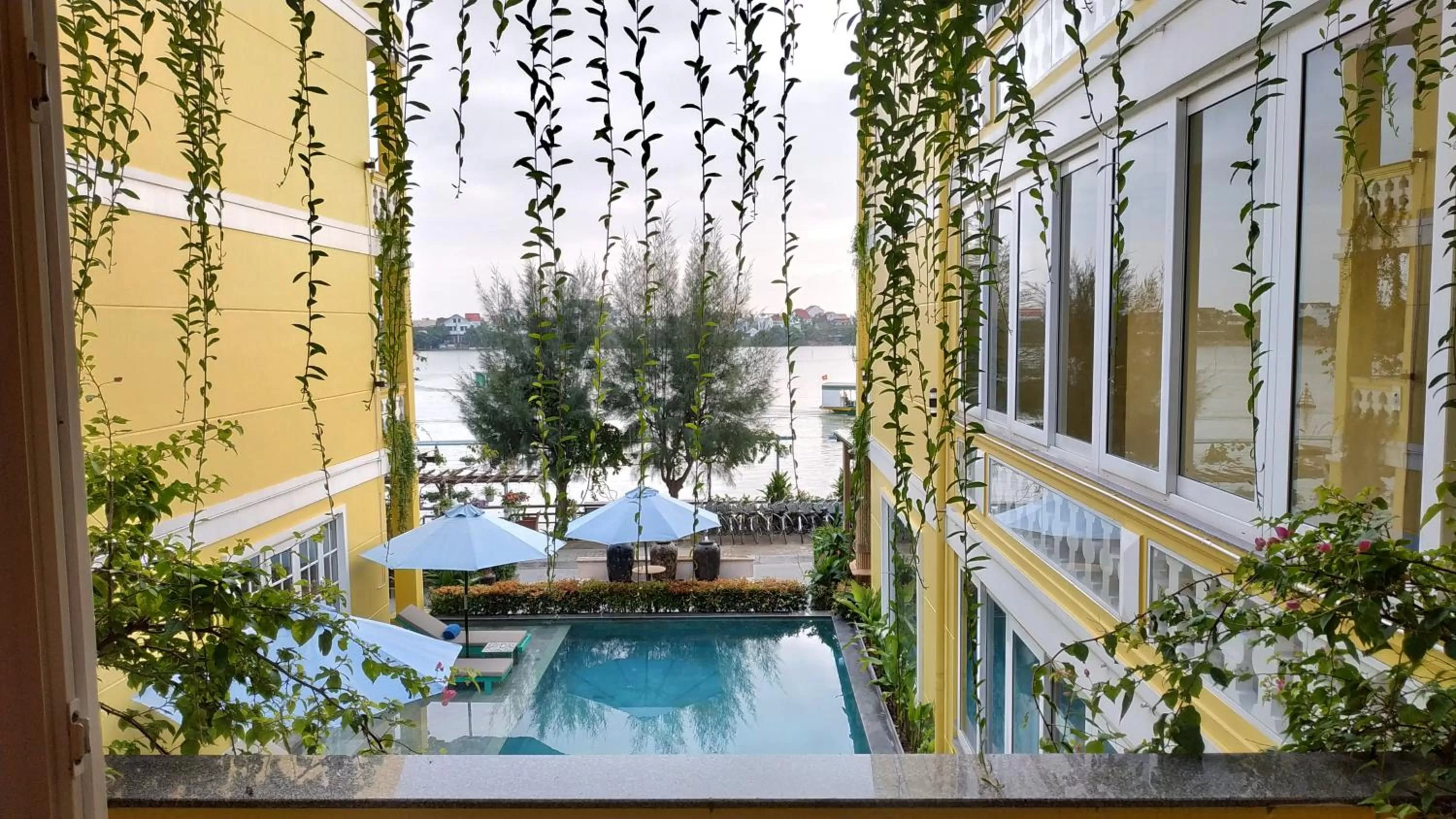 Pool View in TRIPLE Riverside Villa Hotel HoiAn