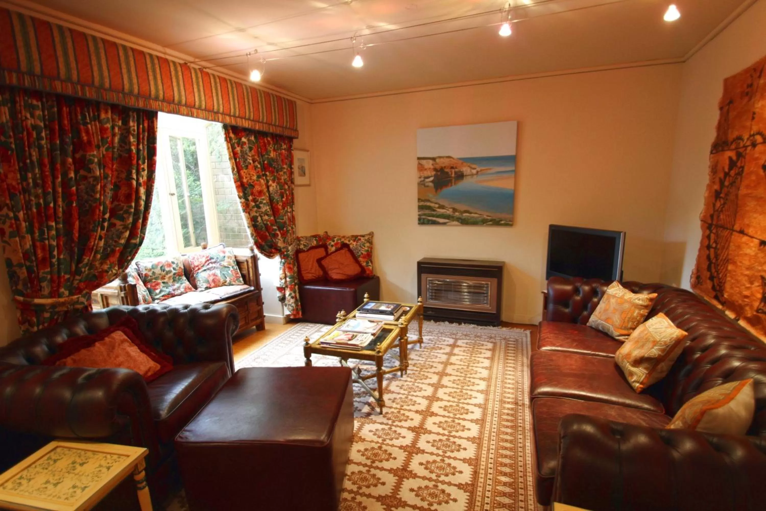 Seating area in North Adelaide Heritage Cottages & Apartments