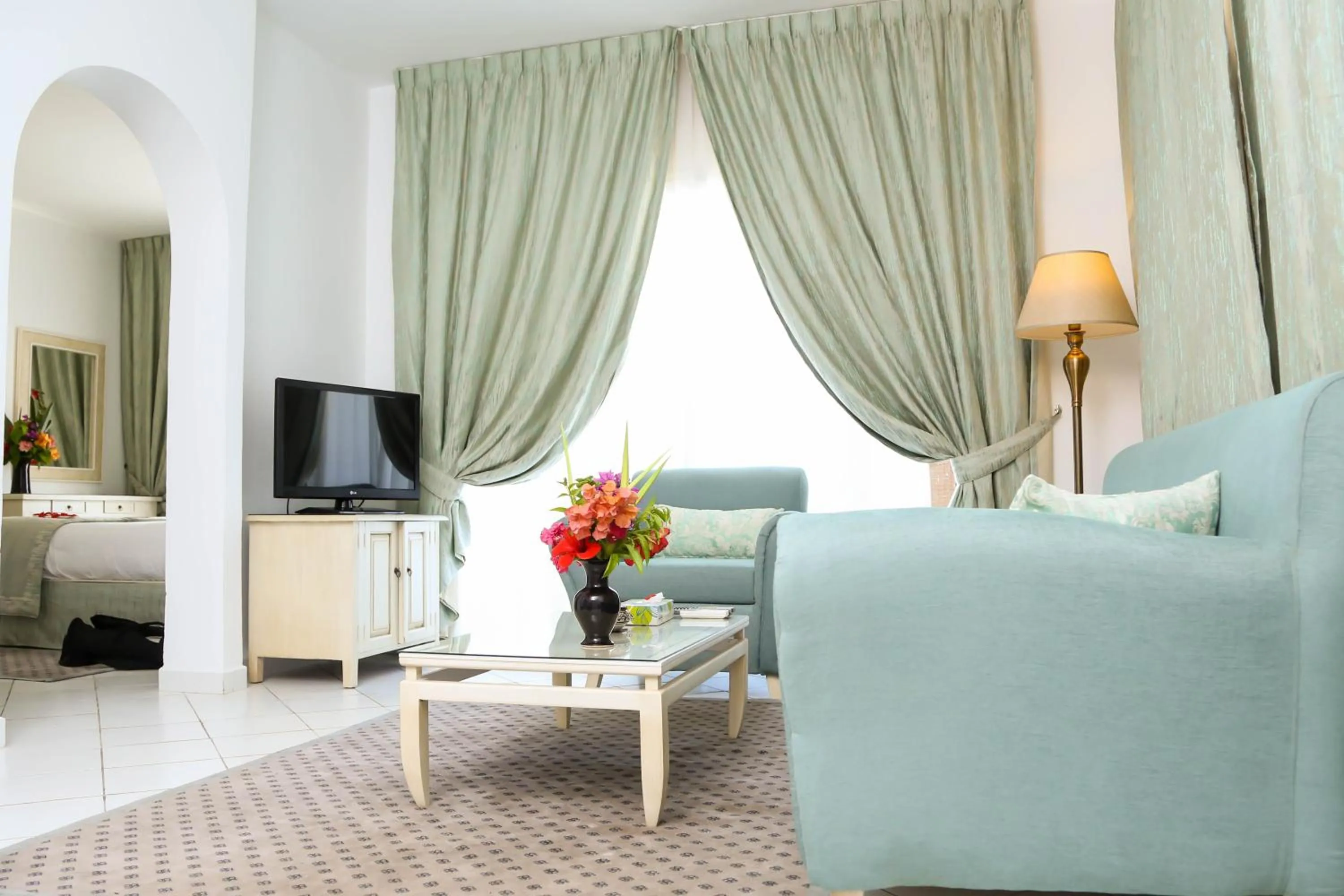 Living room, Bed in Golden Carthage Residences