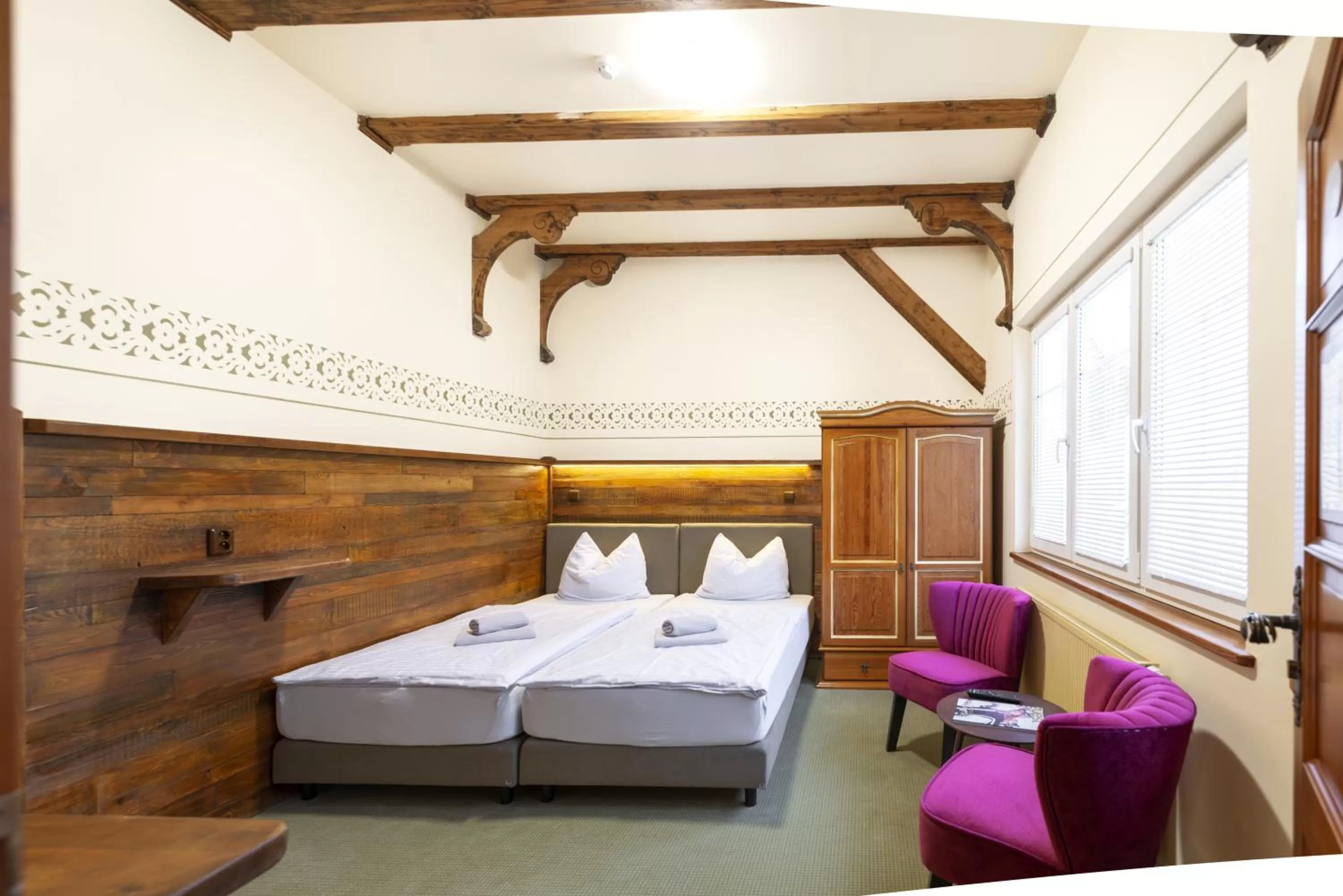 Bed in Hotel U Simla