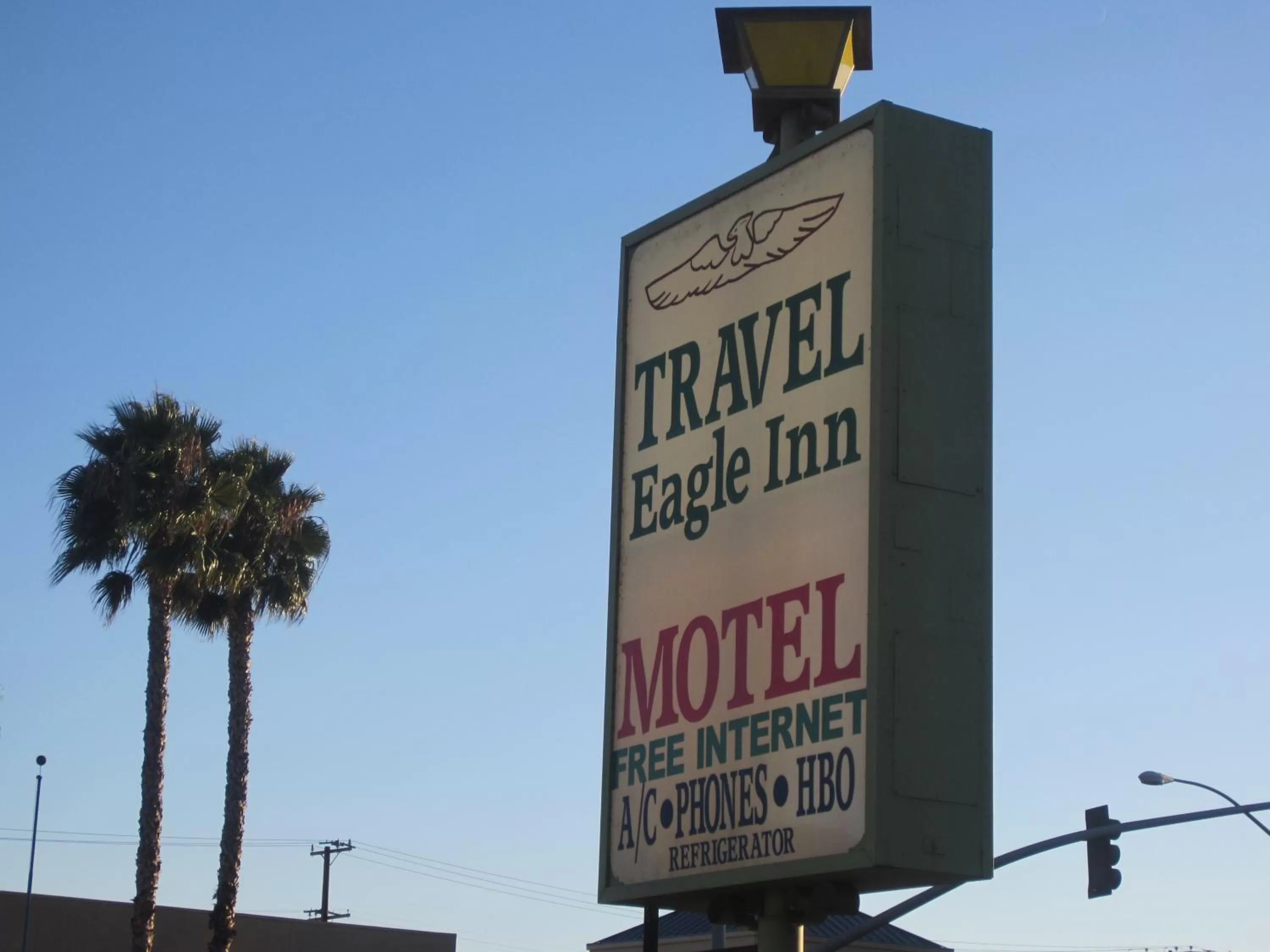 Property logo or sign in Travel Eagle Inn Motel