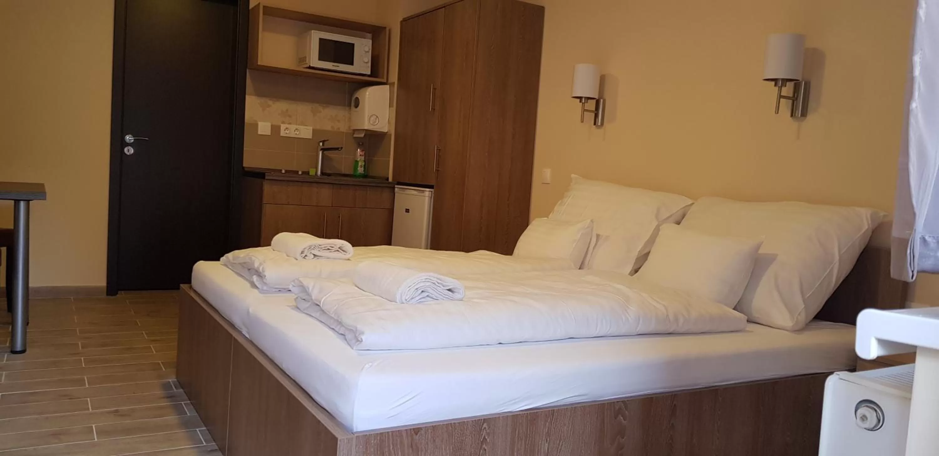 Bed in Central Panzió Gyula