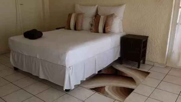 Bed in Moye Guest House