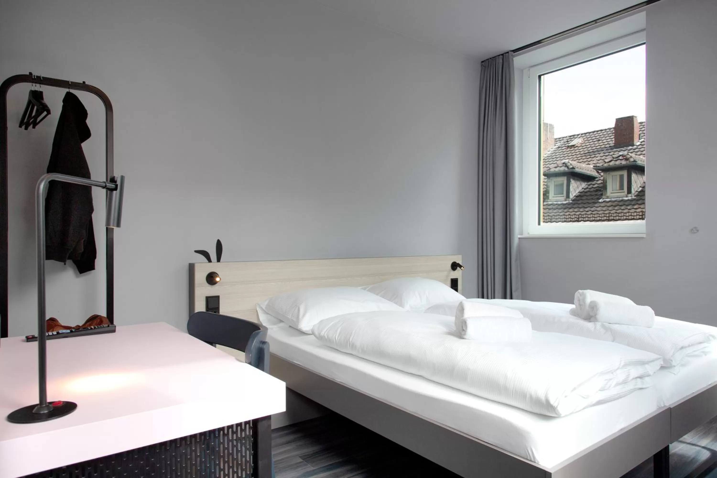 Photo of the whole room, Bed in MEININGER Hotel Bremen Hauptbahnhof