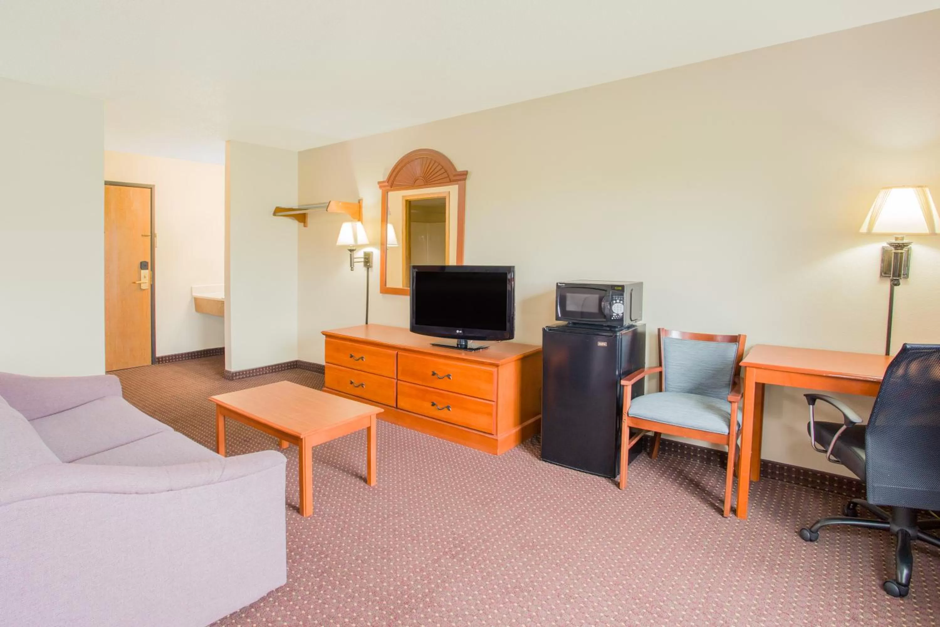 Seating area in Super 8 by Wyndham Waverly