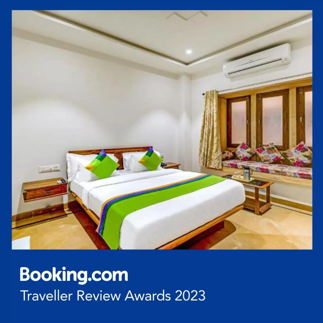 Bedroom in Treebo Trend Chandrangan Excellency