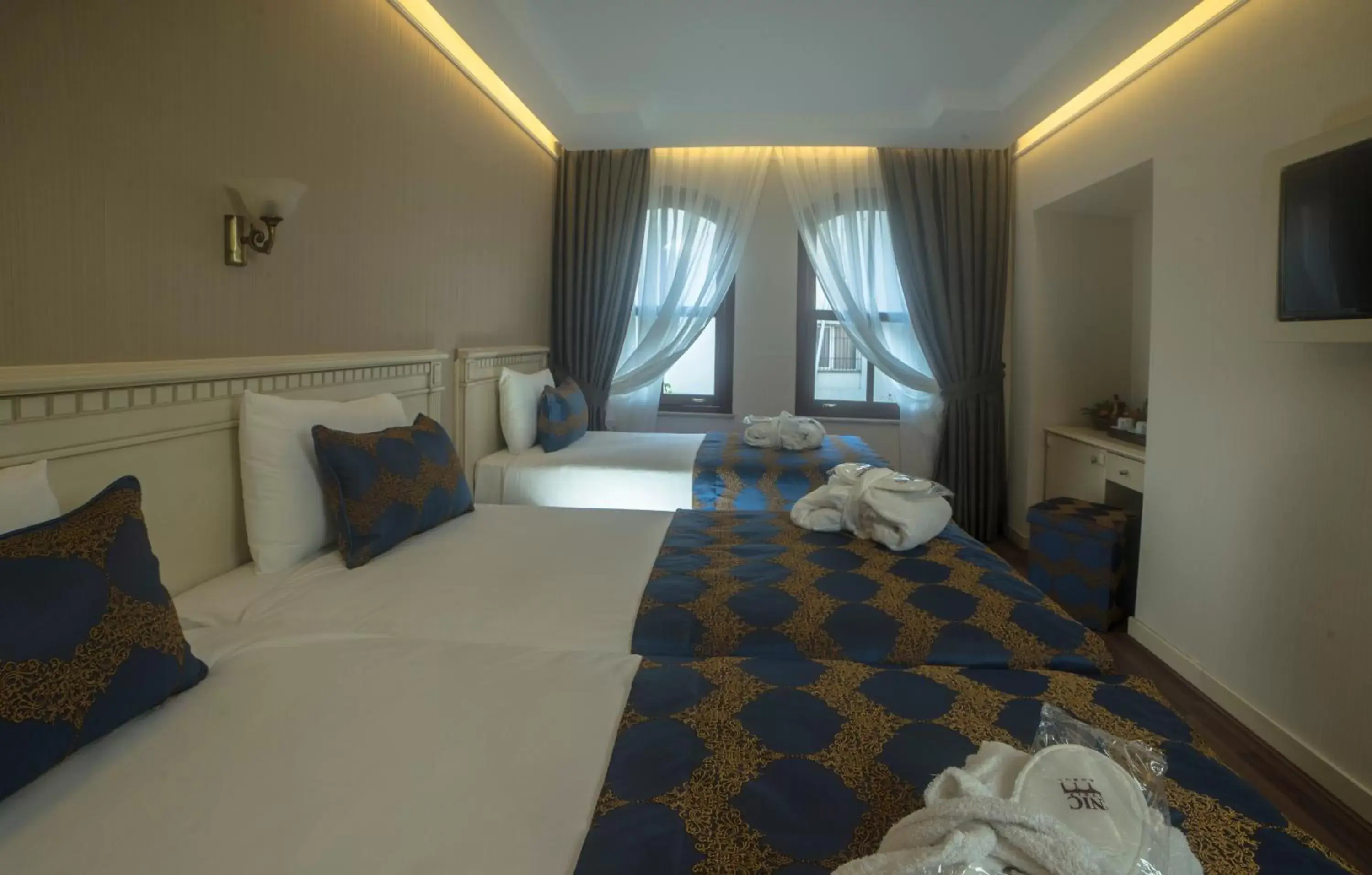 Triple Room in Sarnic Hotel & Sarnic Premier Hotel(Ottoman Mansion) Triple Room in Sarnic Hotel & Sarnic Premier Hotel(Ottoman Mansion)