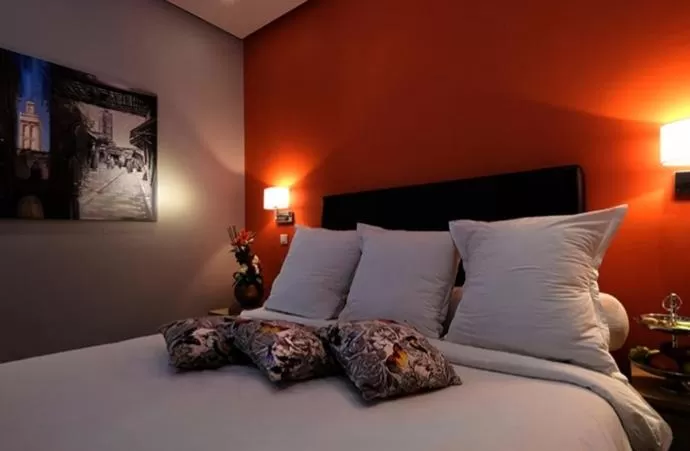 Bed in Le Sphinx Boutique Hôtel