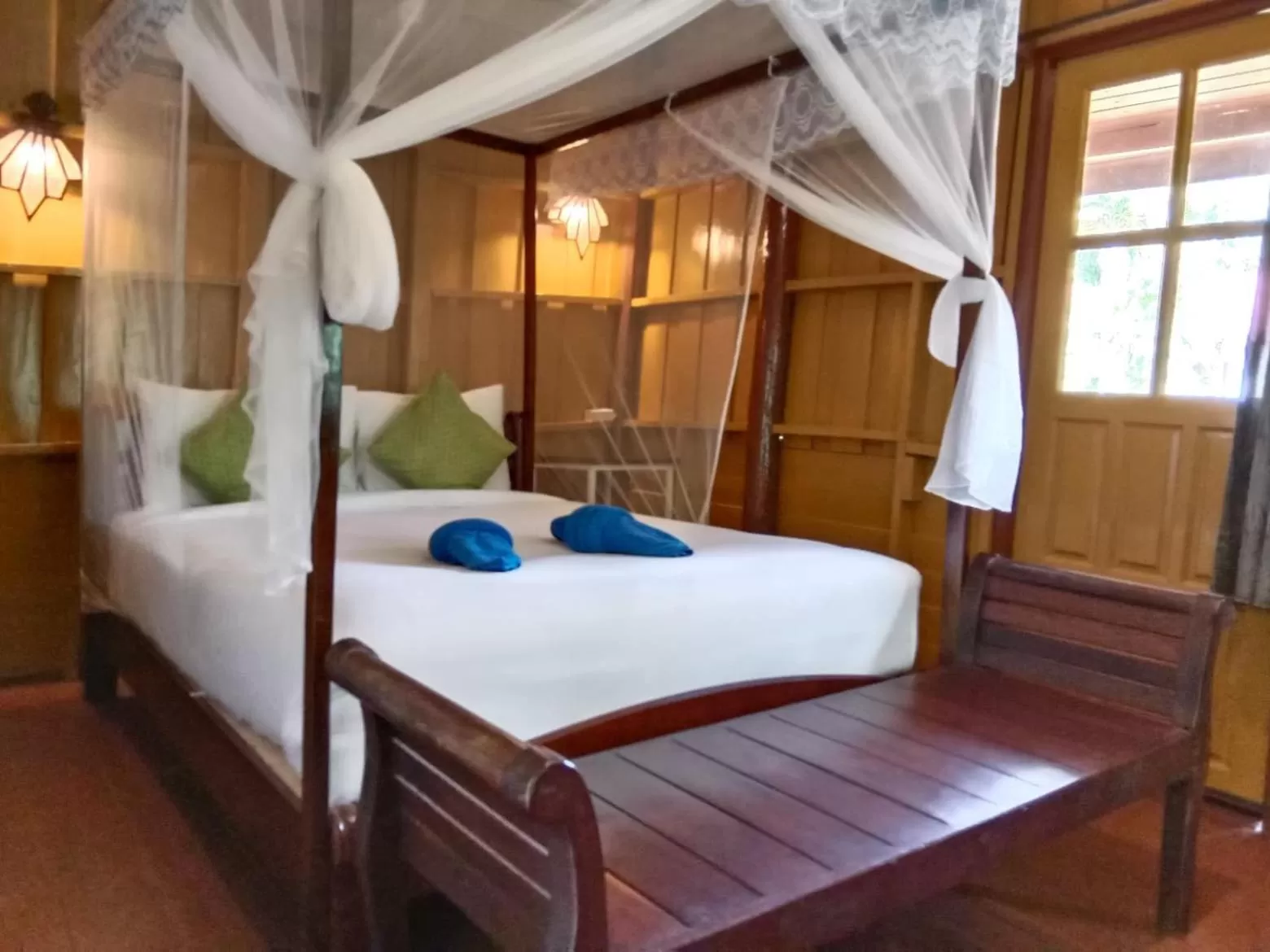 Bed in Tree Tops River Huts