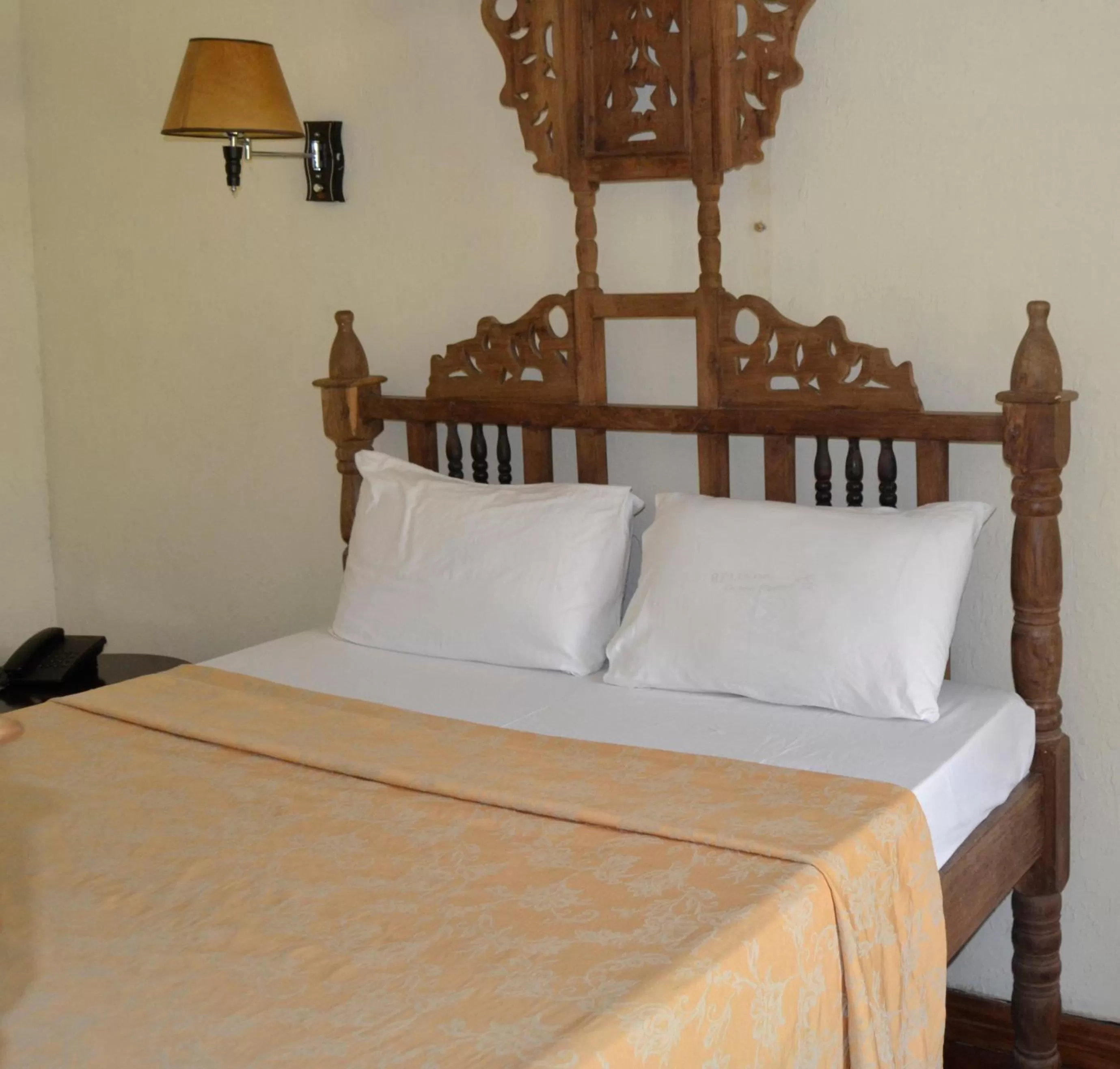 Bed in Serene Beach Resort