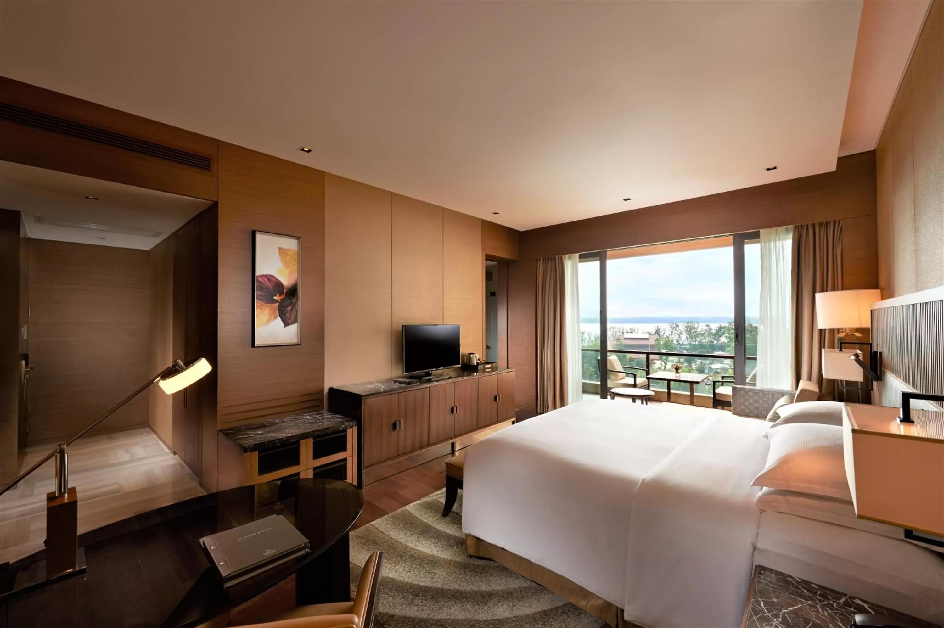 Living room, Bed in Hilton Wuhan Optics Valley